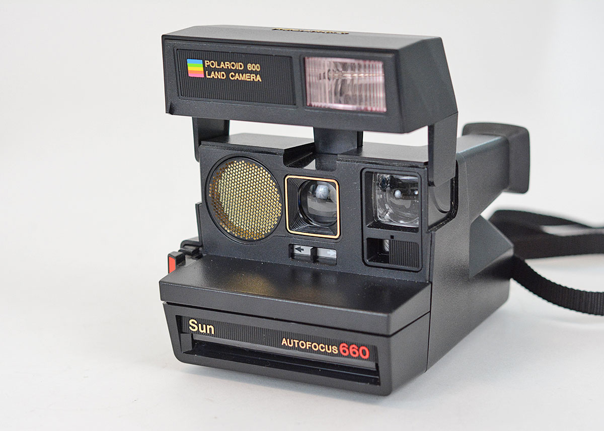 Trio of Polaroid Cameras with Flashgun
