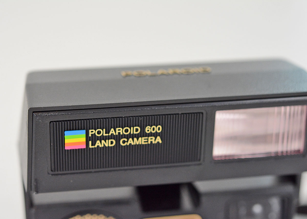 Trio of Polaroid Cameras with Flashgun