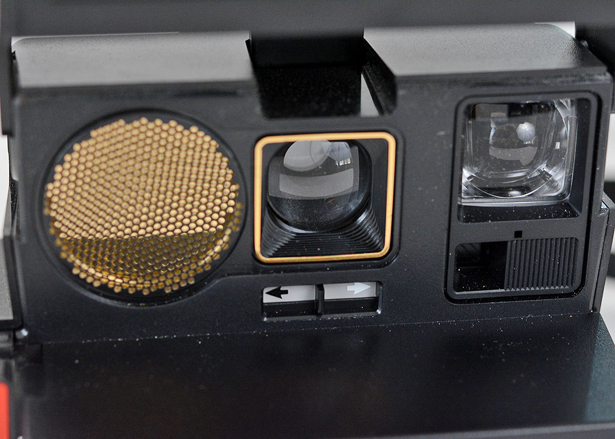 Trio of Polaroid Cameras with Flashgun