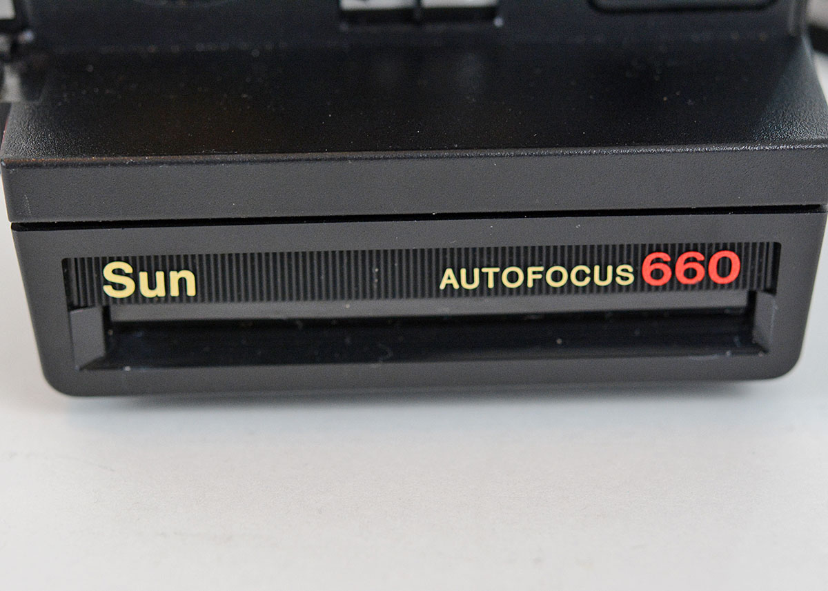 Trio of Polaroid Cameras with Flashgun