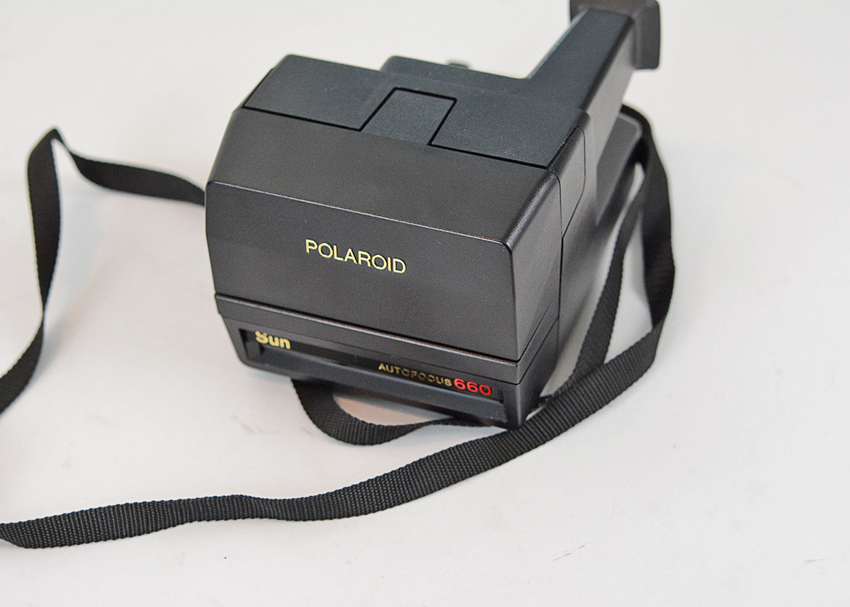 Trio of Polaroid Cameras with Flashgun