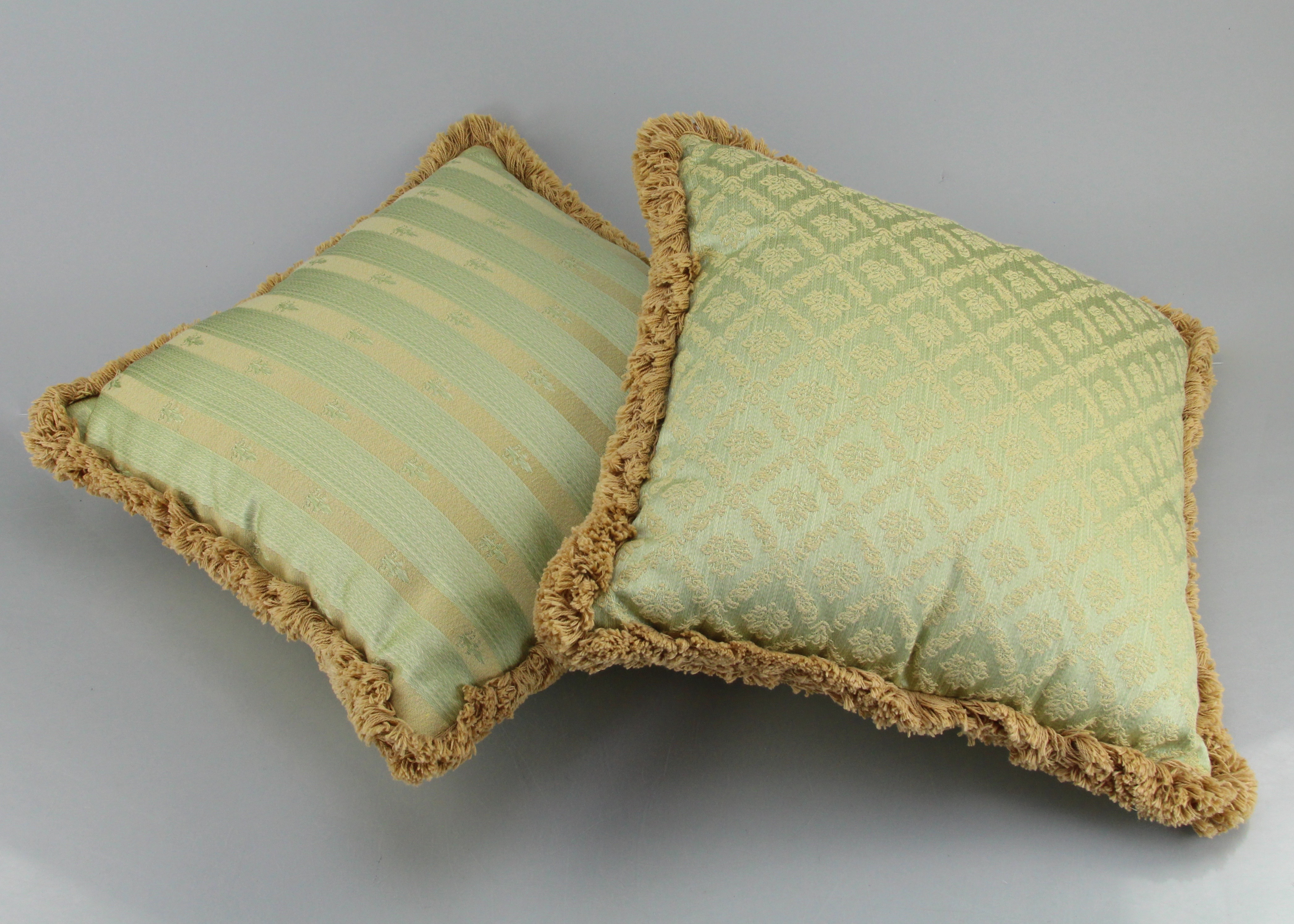 Two Matching Green And Tan Decorative Couch Pillows