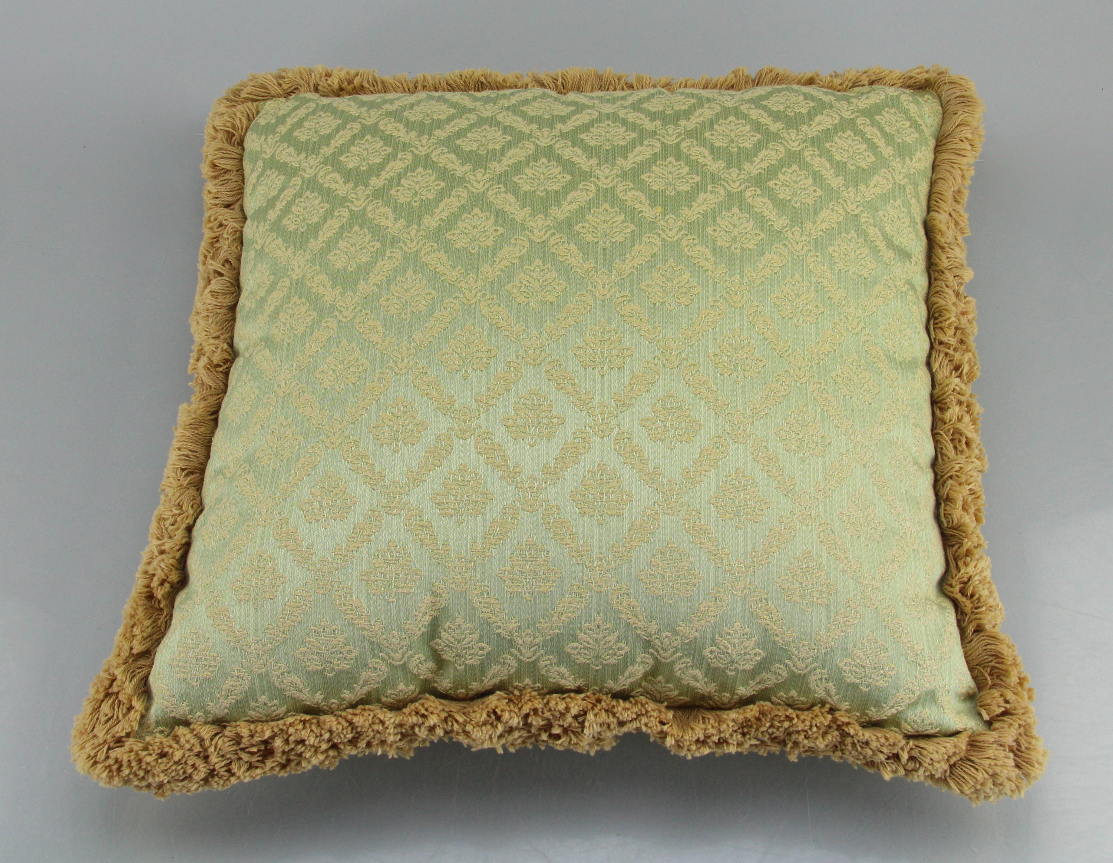 Two Matching Green And Tan Decorative Couch Pillows