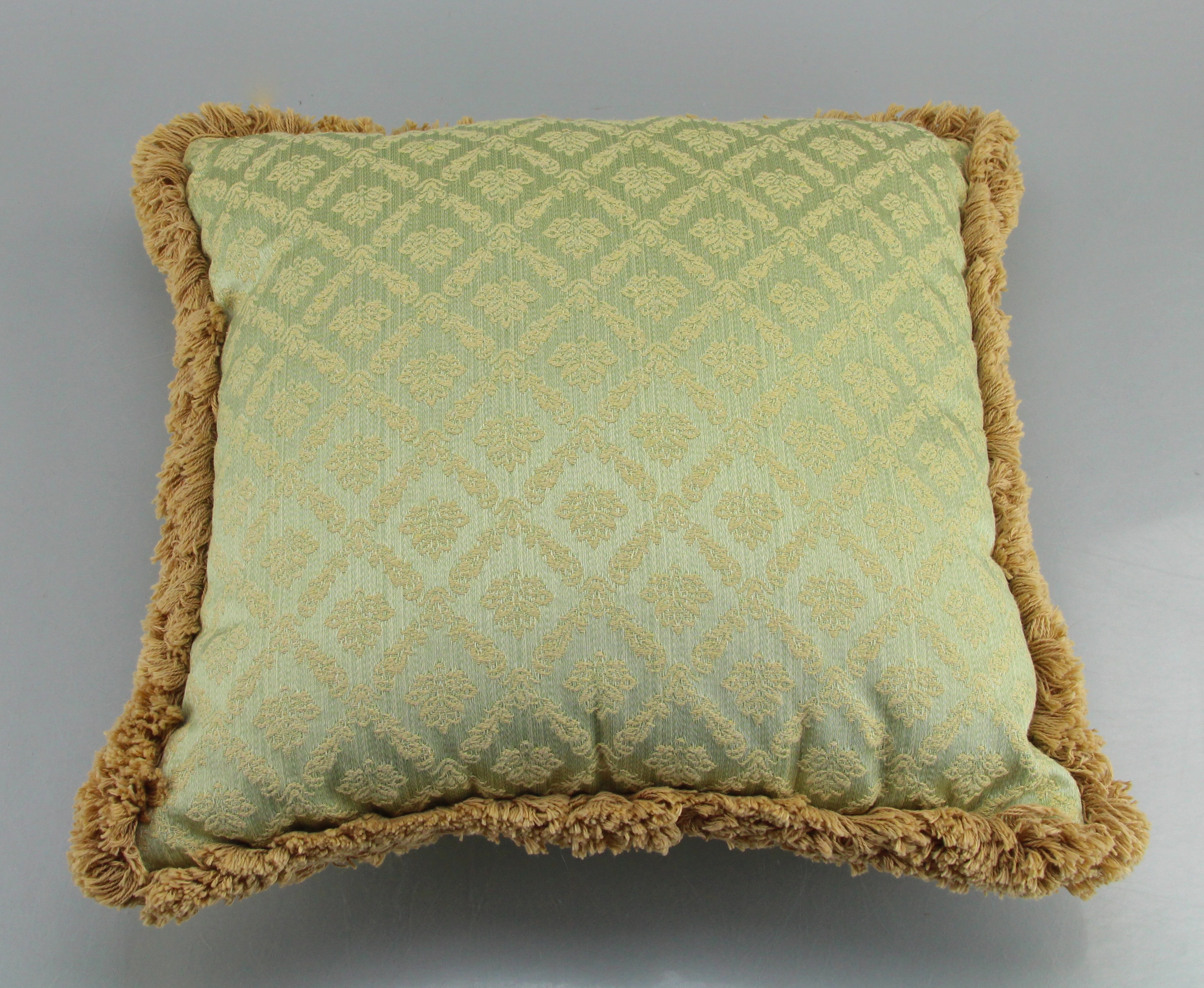 Two Matching Green And Tan Decorative Couch Pillows