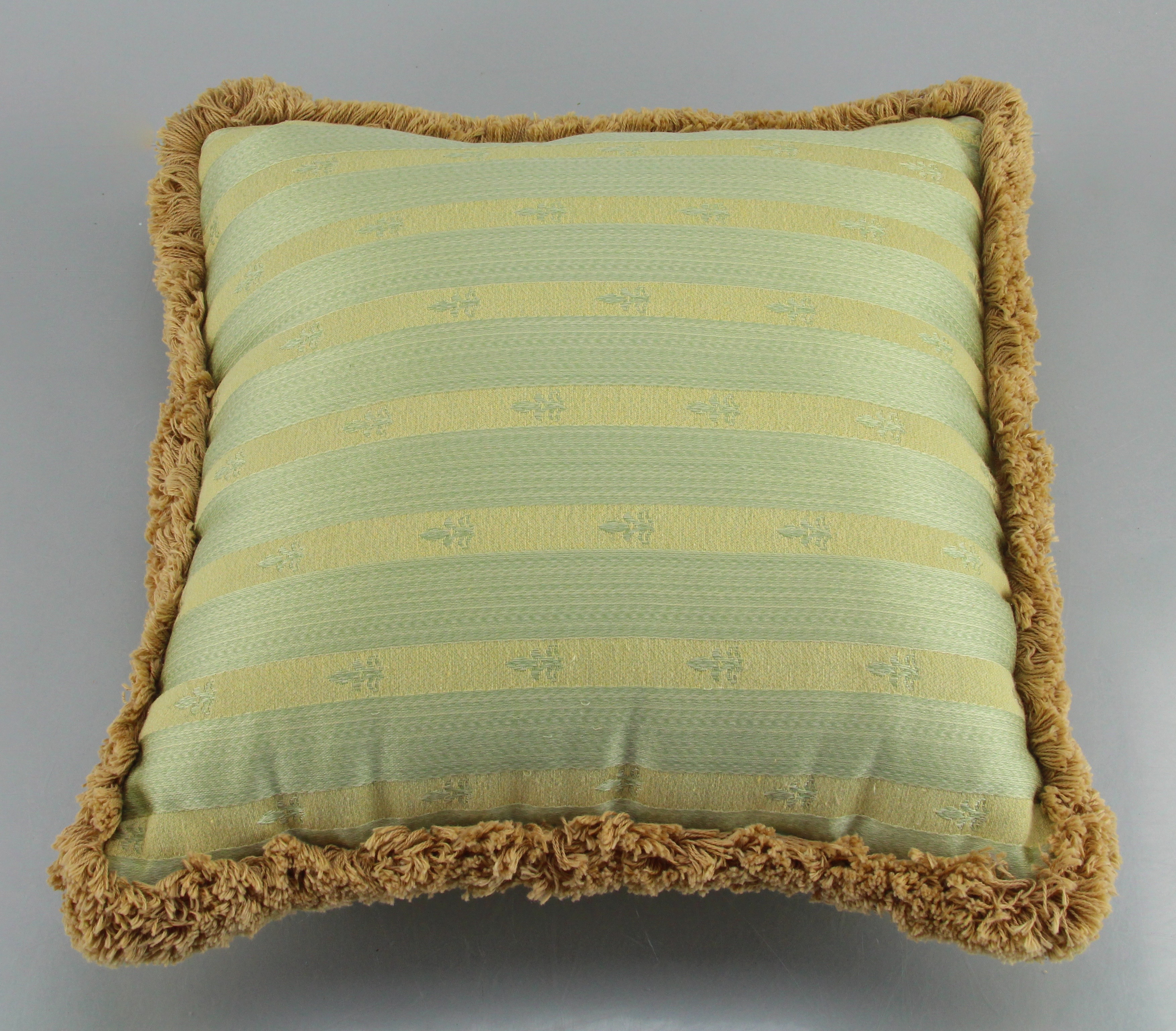 Two Matching Green And Tan Decorative Couch Pillows