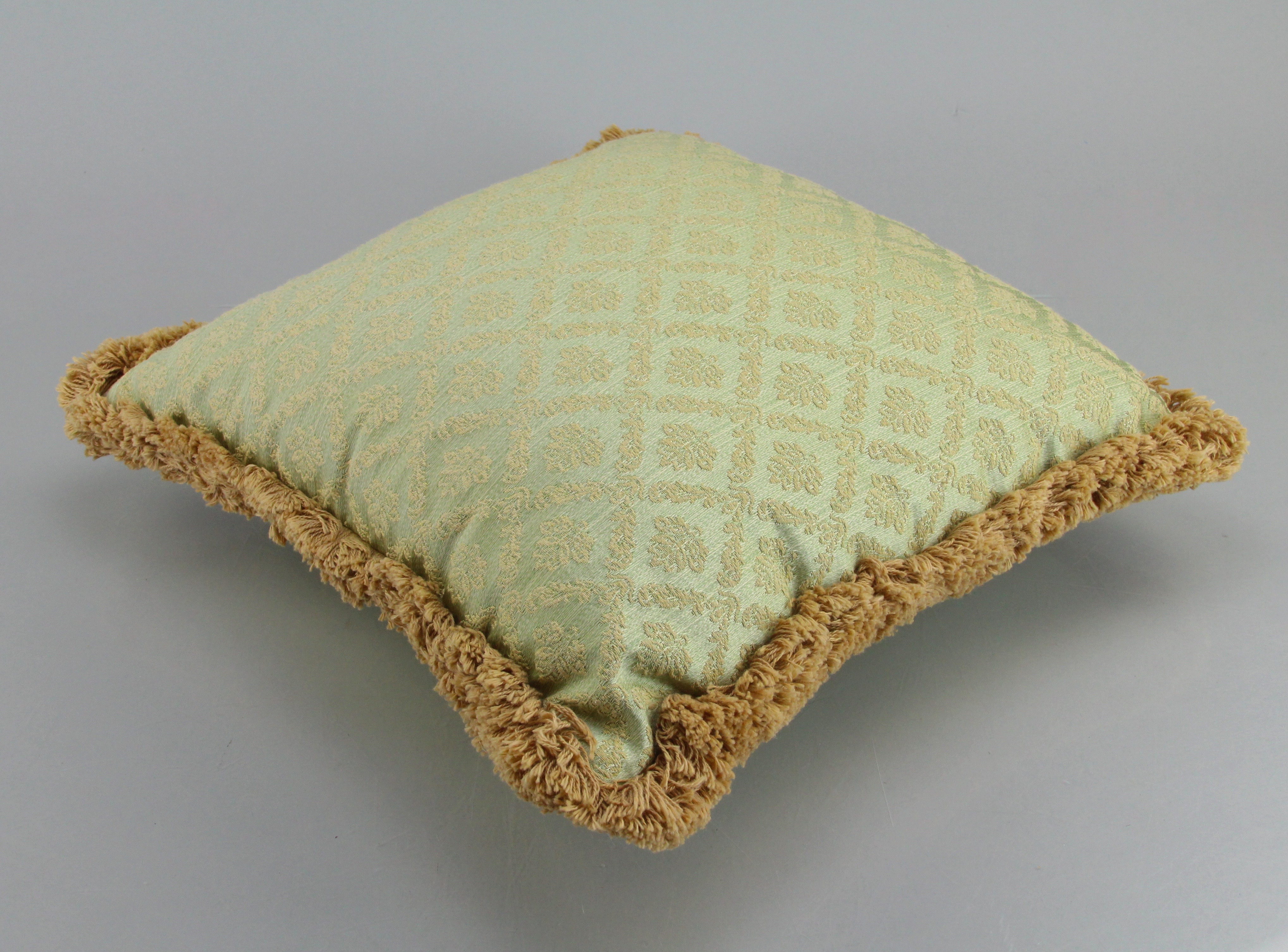 Two Matching Green And Tan Decorative Couch Pillows