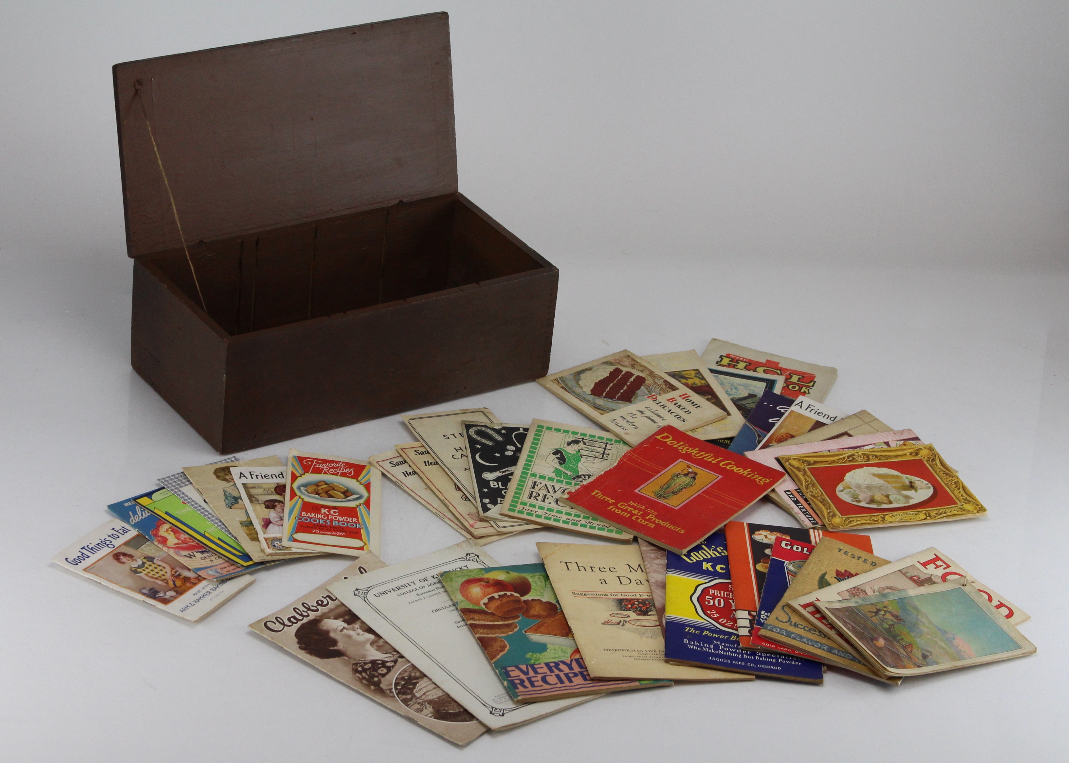 Vintage Recipe Booklets And Newspaper Clippings In Old Wooden Box