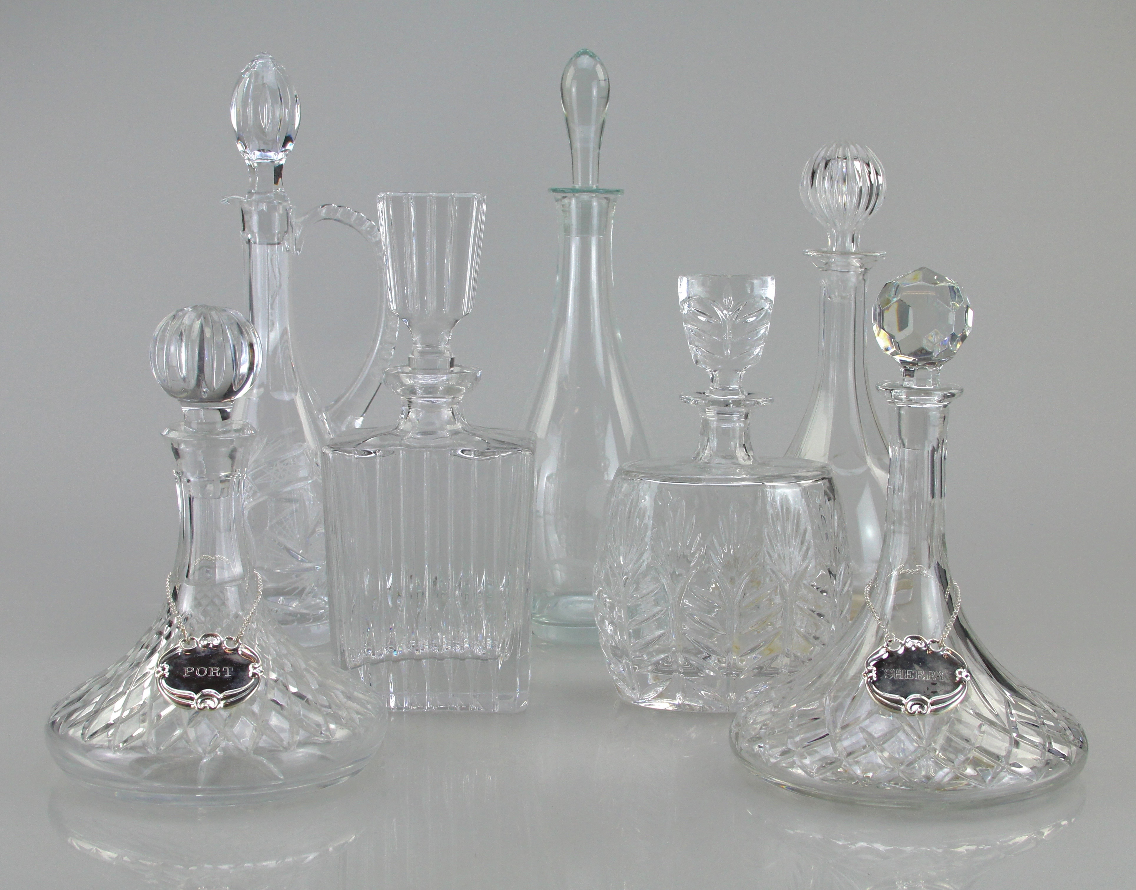 Assortment Of Seven Crystal Decanters