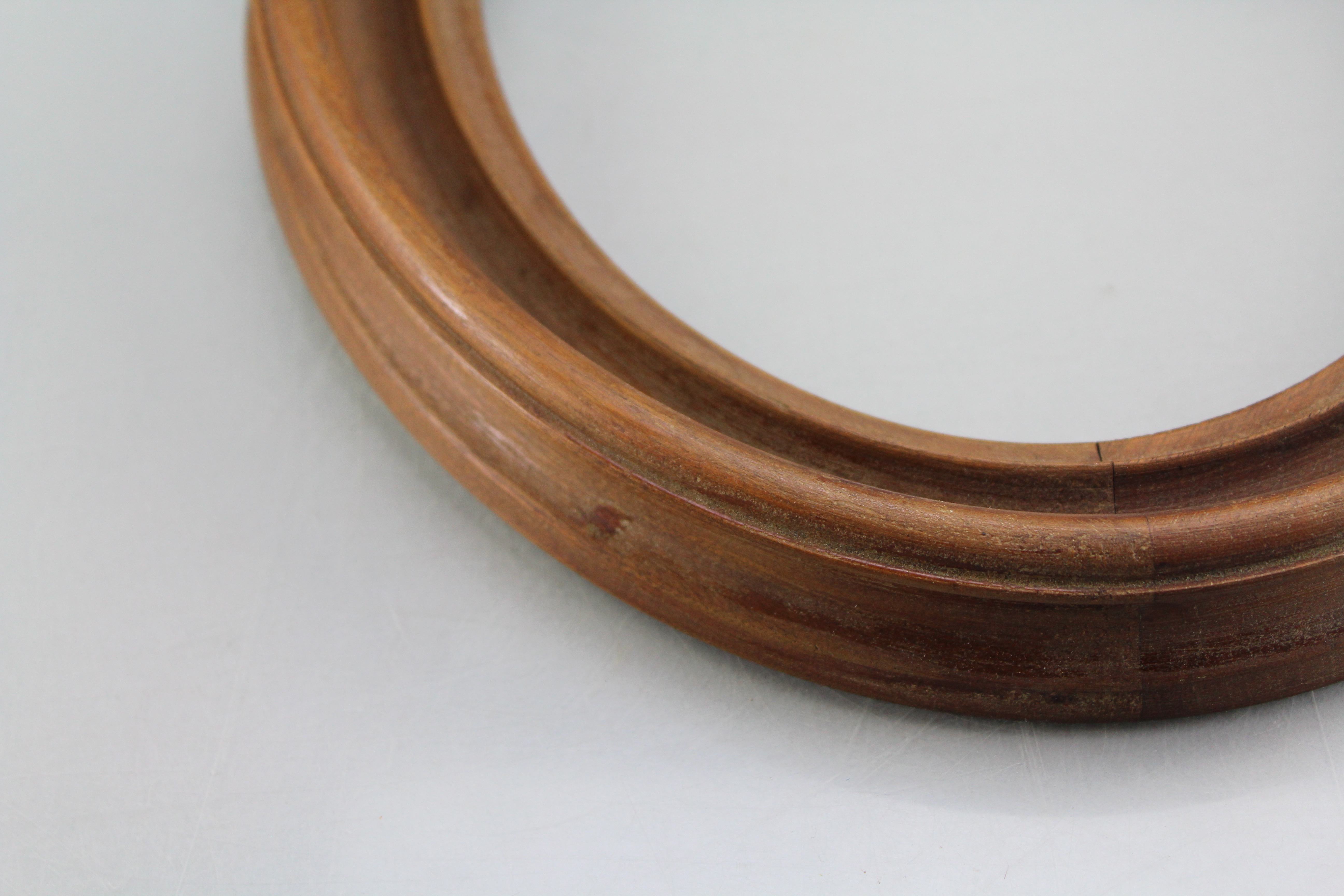 Assortment of Oval Wooden Framed Portrait Photos and Empty Frames