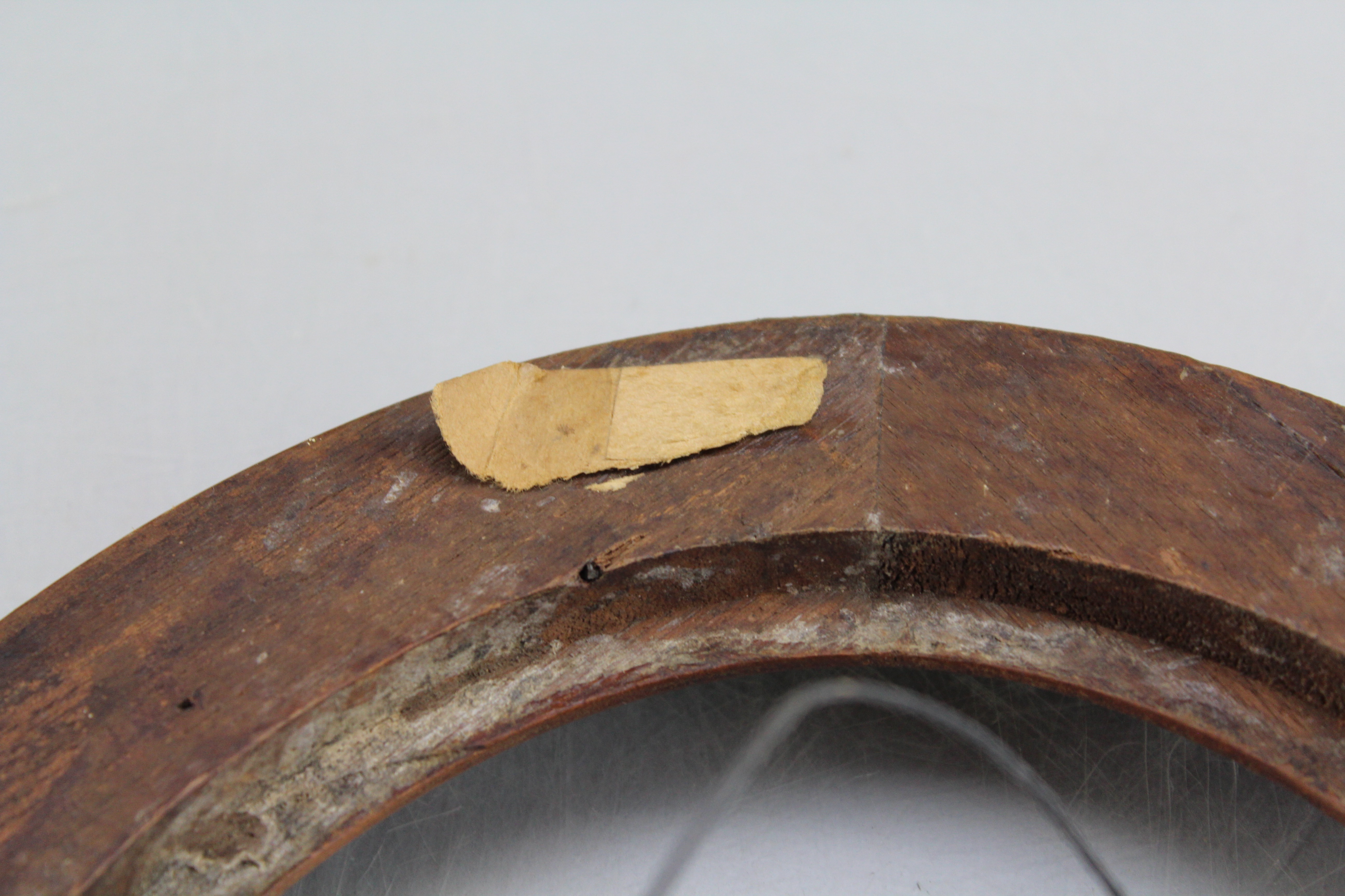 Assortment of Oval Wooden Framed Portrait Photos and Empty Frames