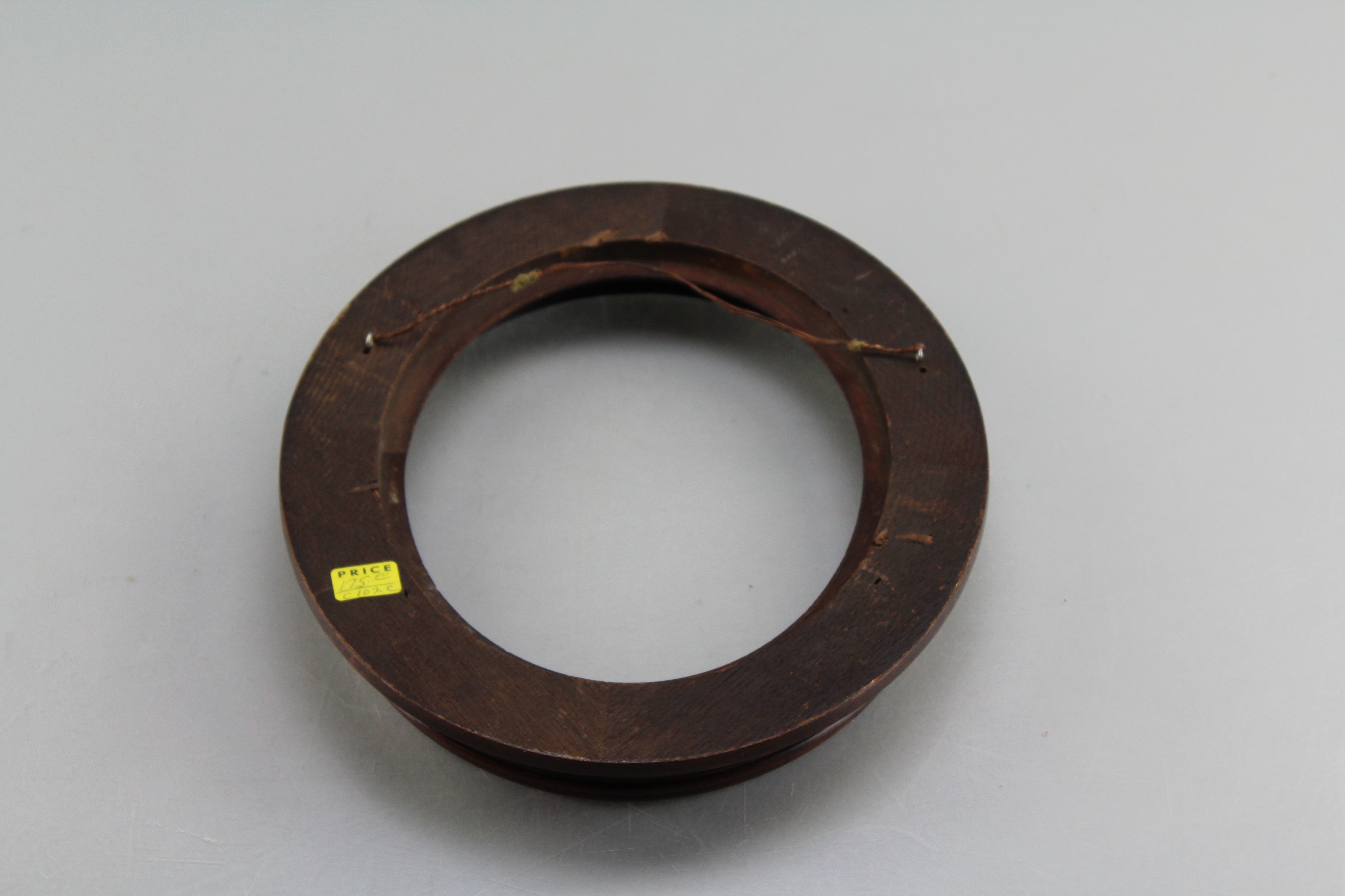 Assortment of Oval Wooden Framed Portrait Photos and Empty Frames