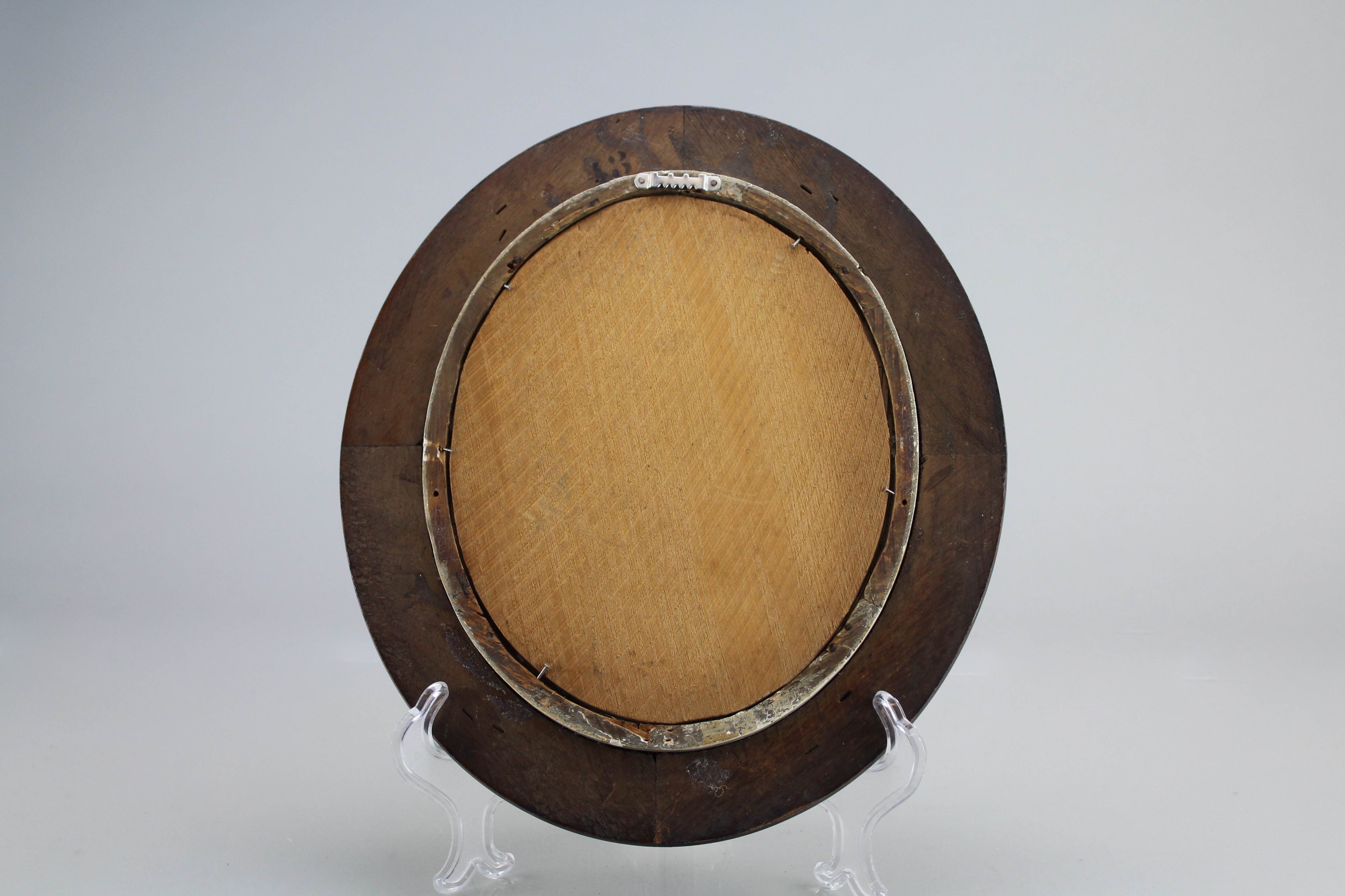 Assortment of Oval Wooden Framed Portrait Photos and Empty Frames