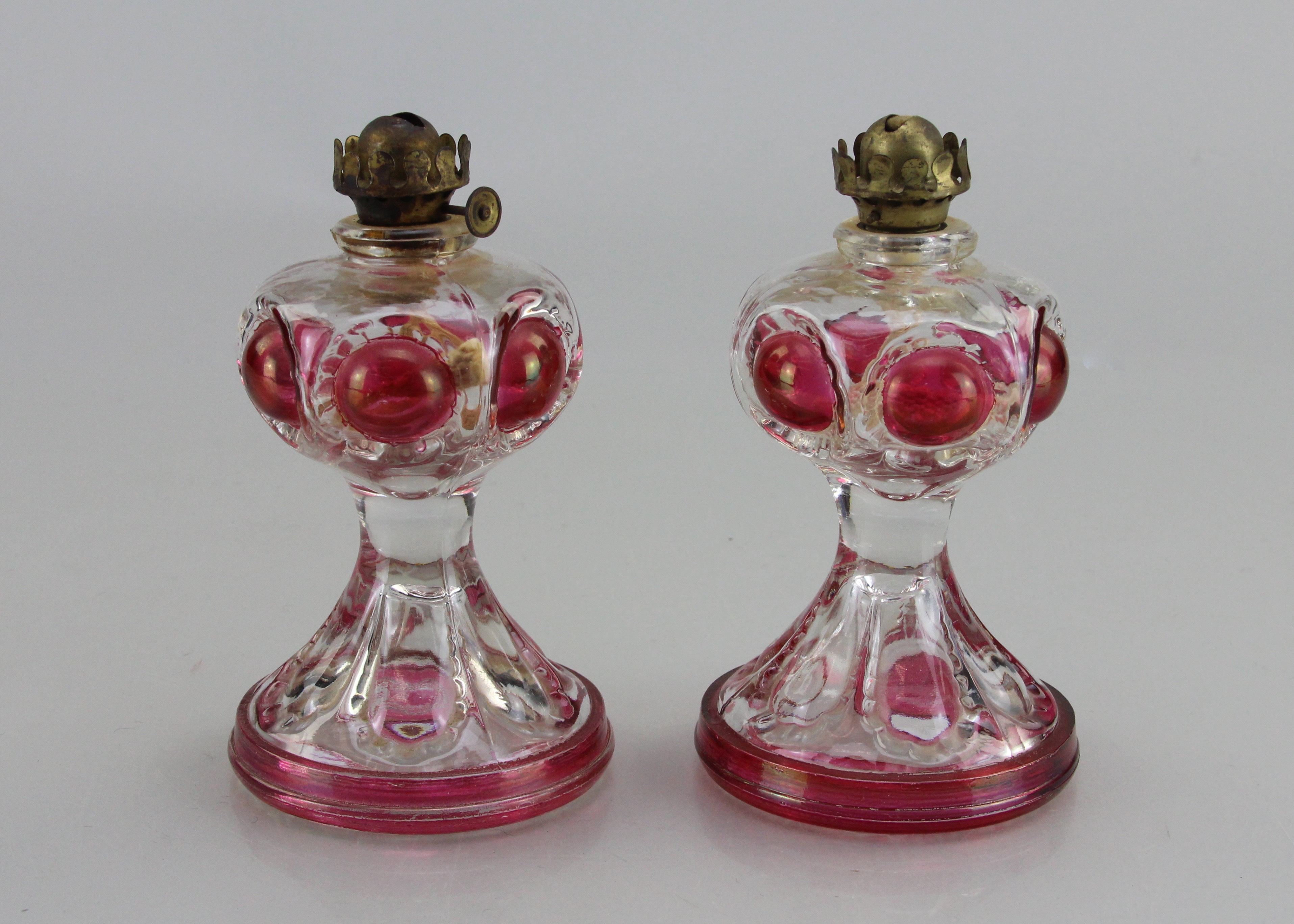 Matching Duo of Clear Rose Colored Small Bulbous Oil Lamp