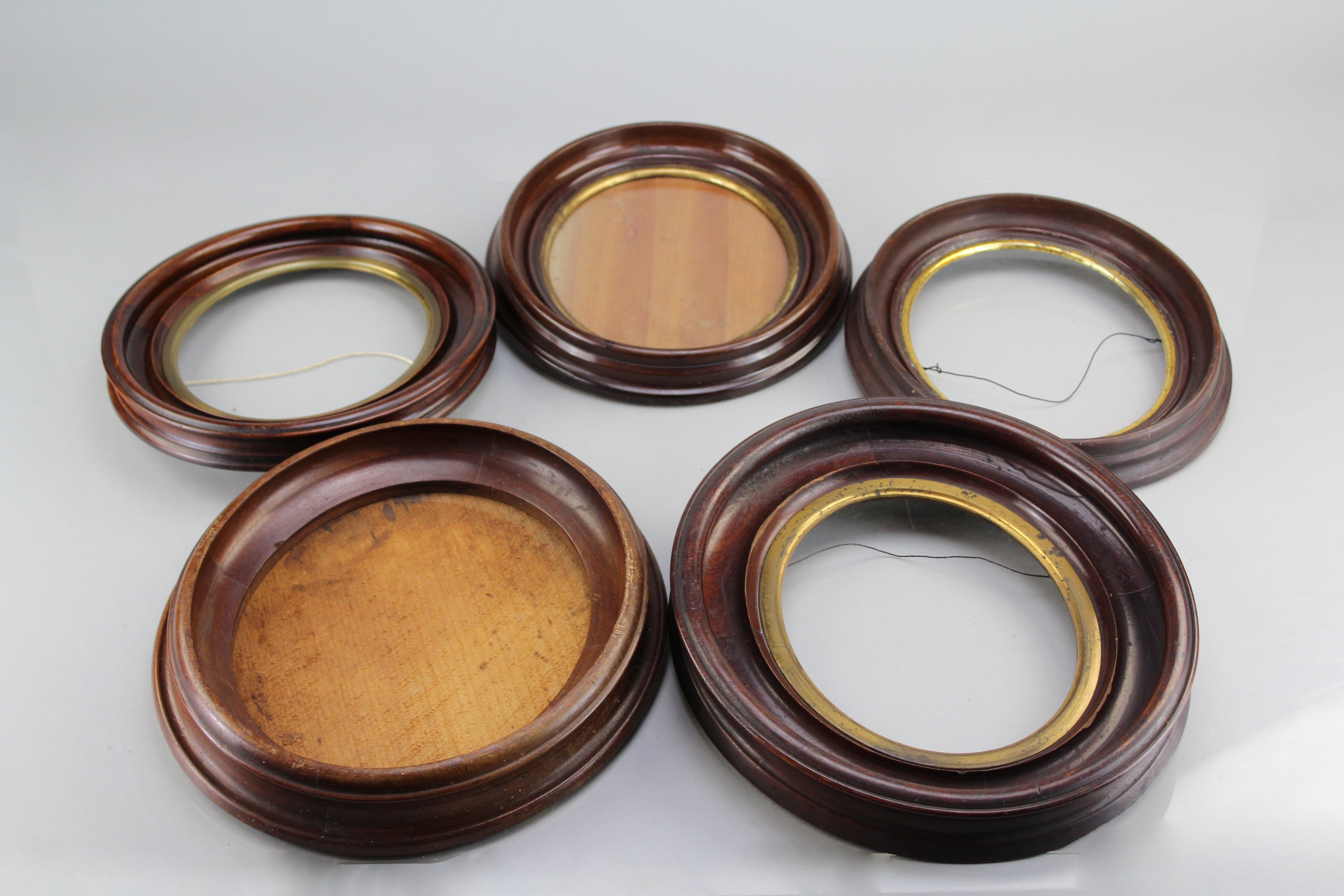 Assortment of Oval Wooden Framed Needle Point Art and Empty Frame