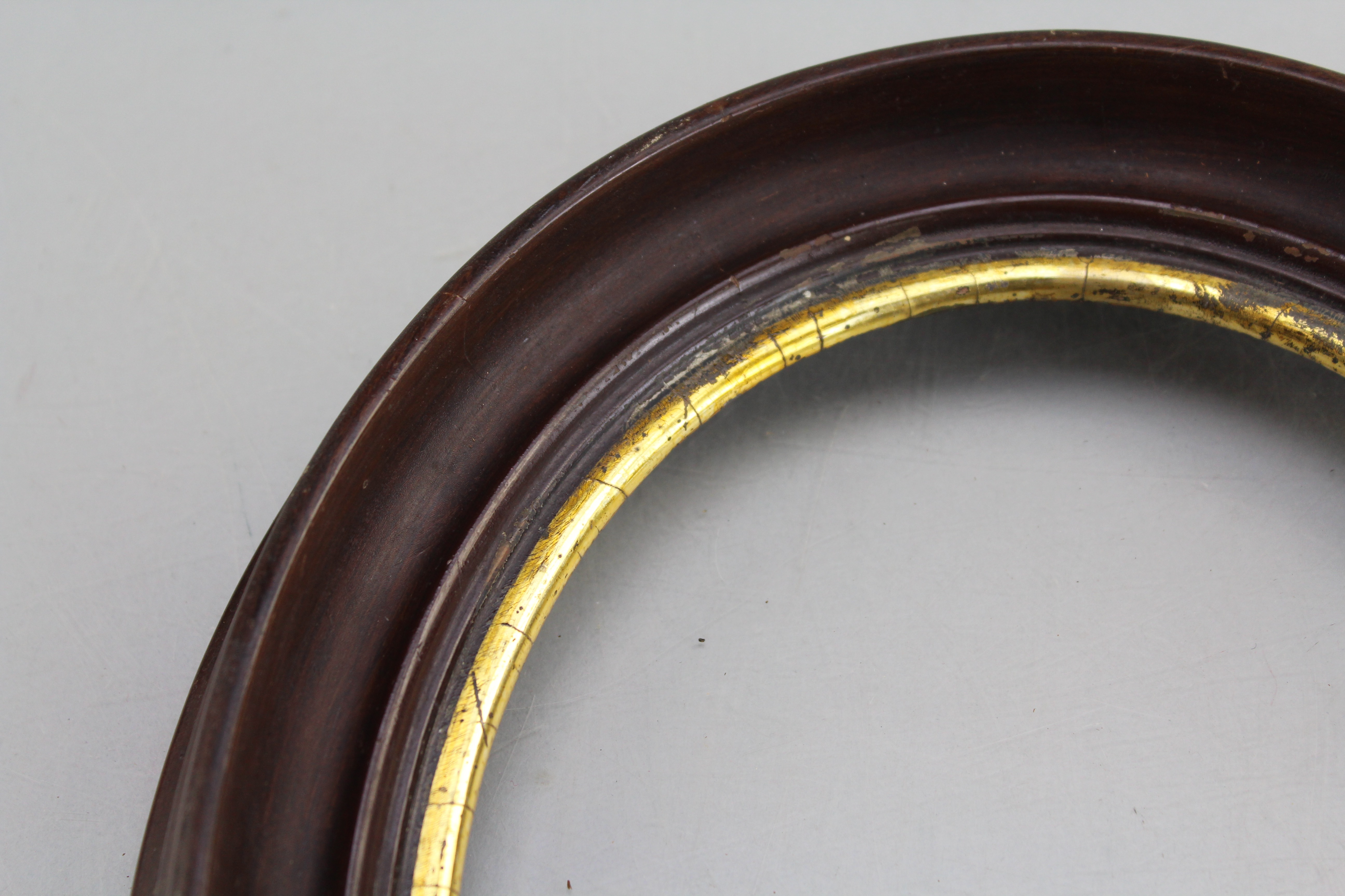 Assortment of Oval Wooden Framed Needle Point Art and Empty Frame