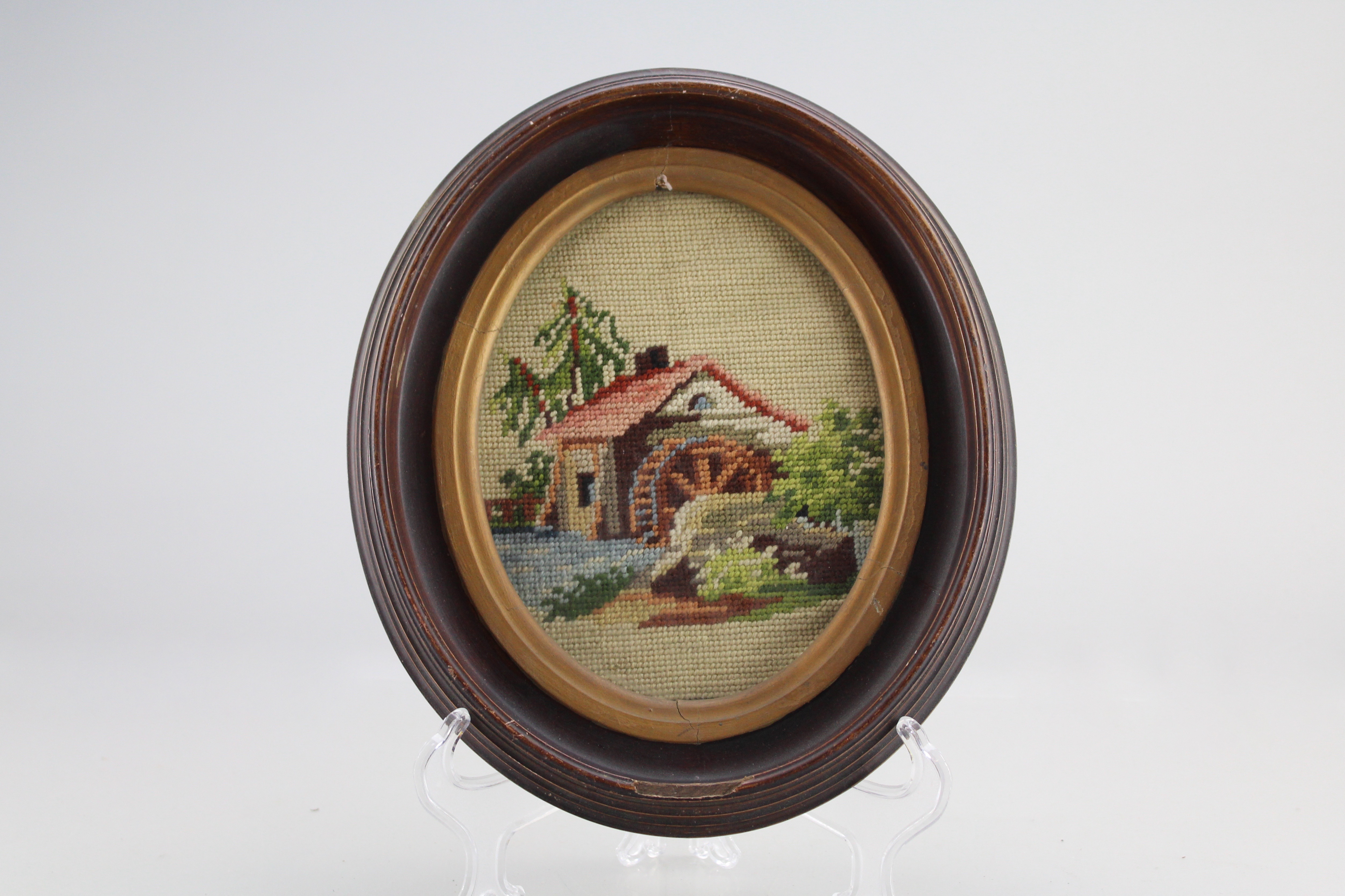 Assortment of Oval Wooden Framed Needle Point Art and Empty Frame