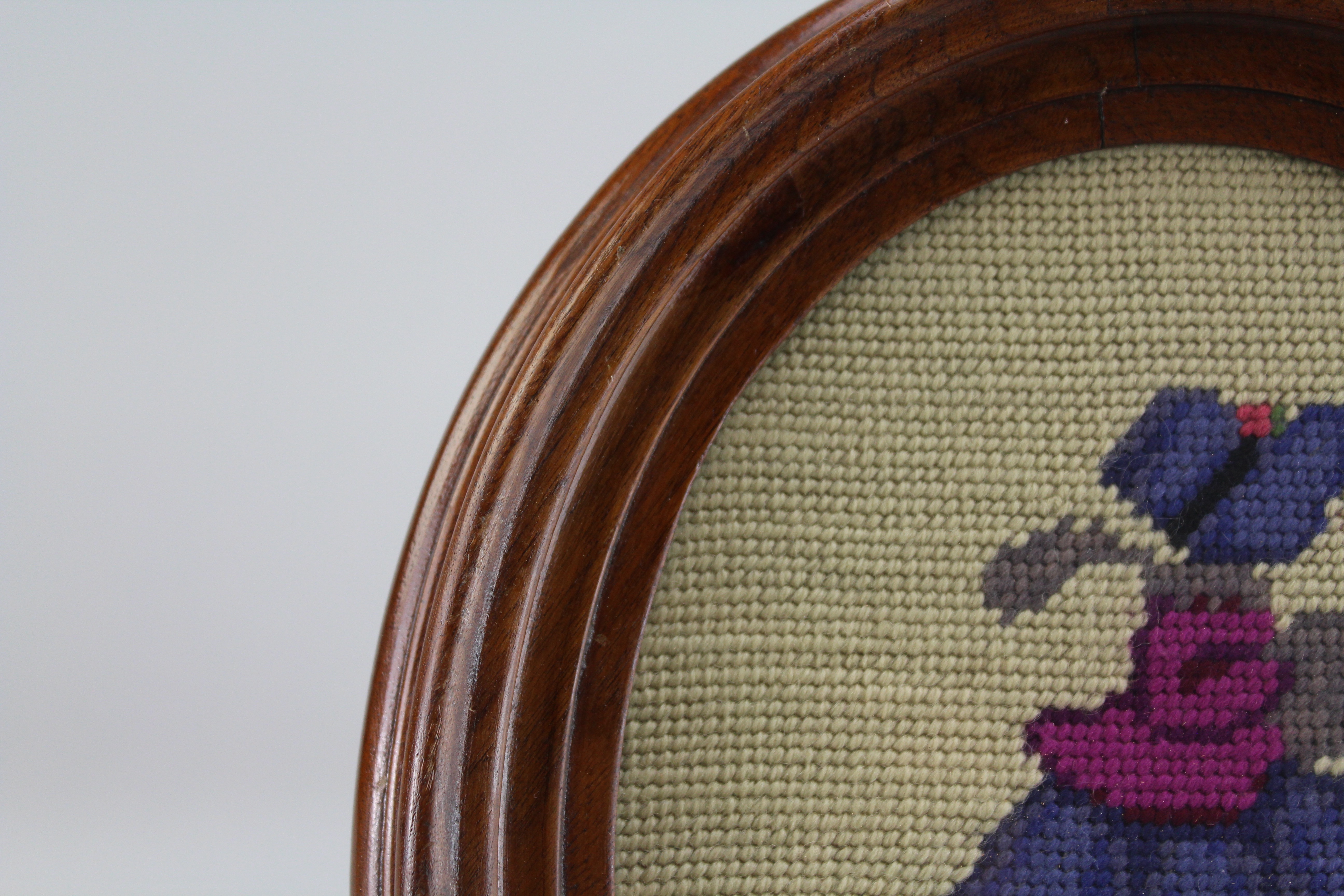 Assortment of Oval Wooden Framed Needle Point Art and Empty Frame