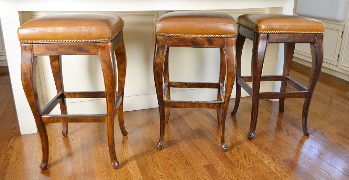 Four Frontgate Leather Bar Stools