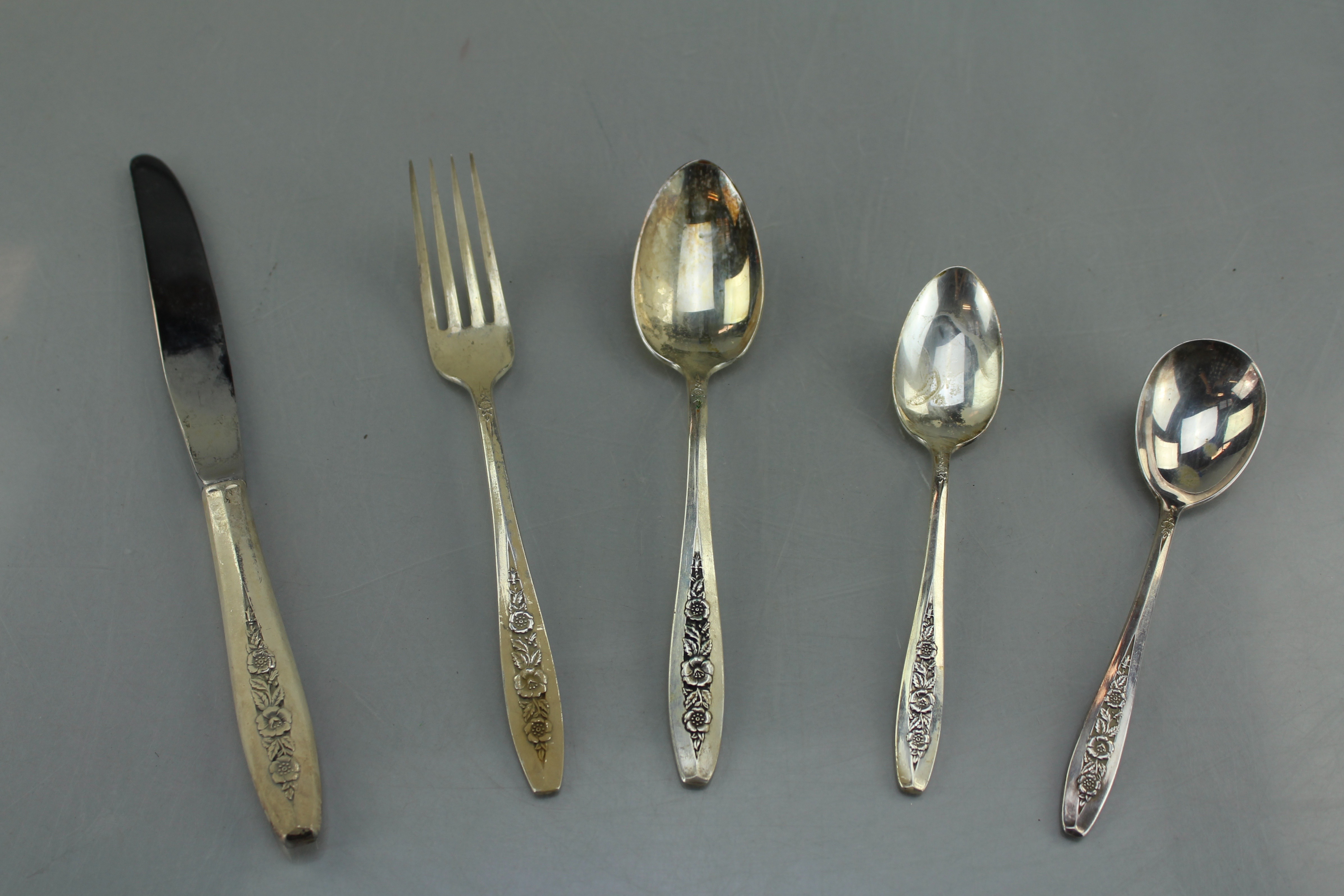 A W.M. Rogers and Son Silverplate Flatware Set in Pine Wooden Box
