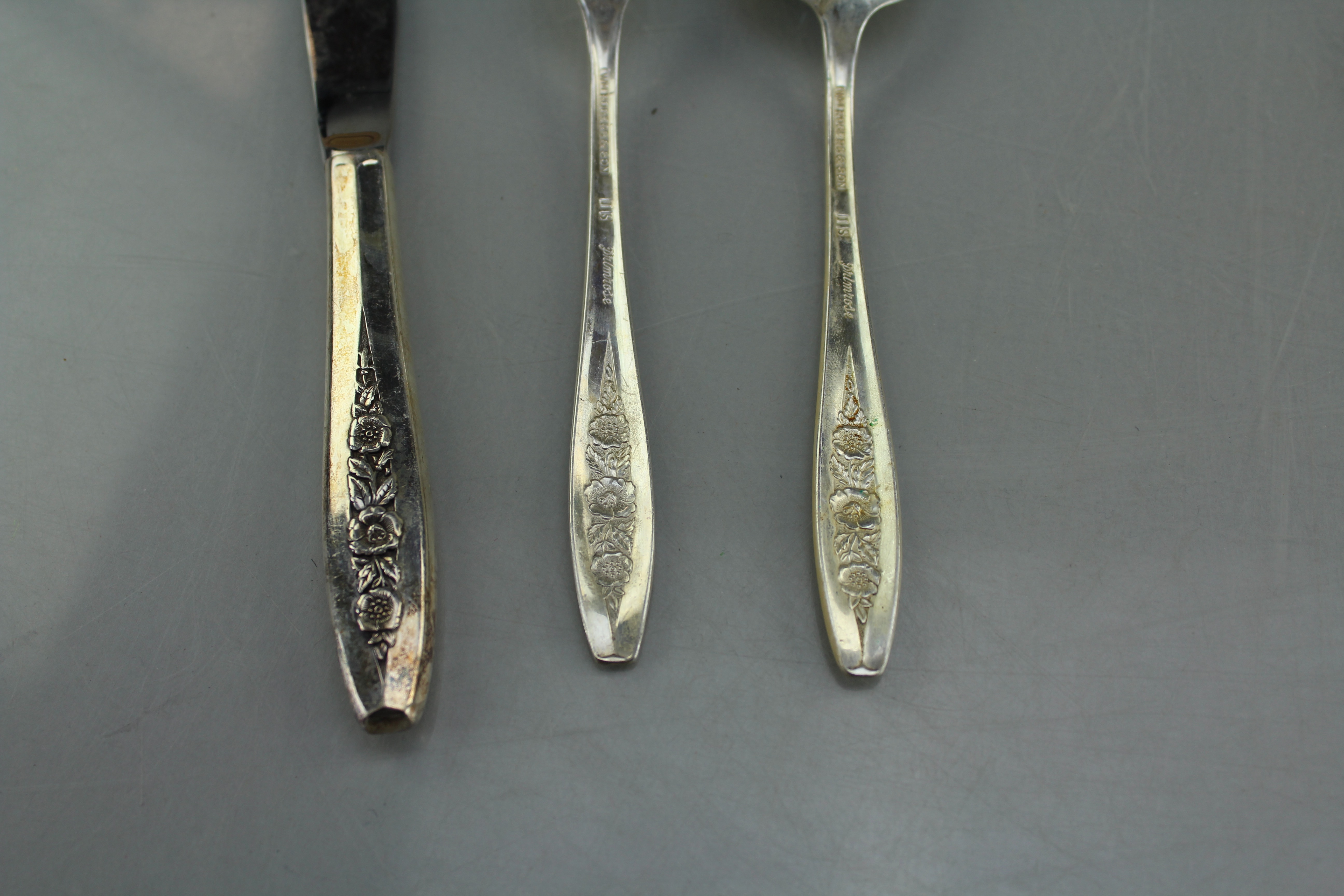 A W.M. Rogers and Son Silverplate Flatware Set in Pine Wooden Box