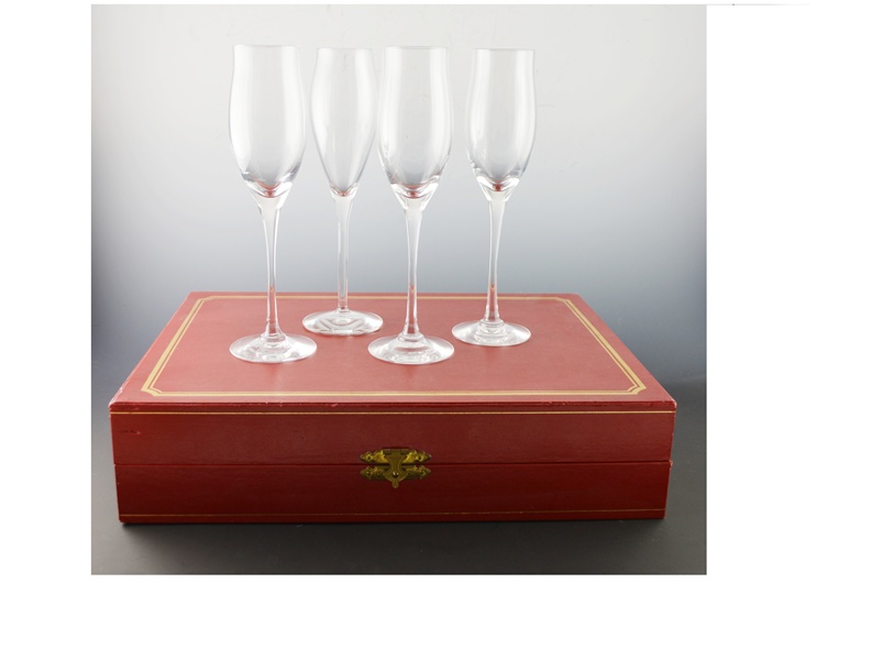 Eight Cartier Crystal Tulip-Flared Champagne Flutes