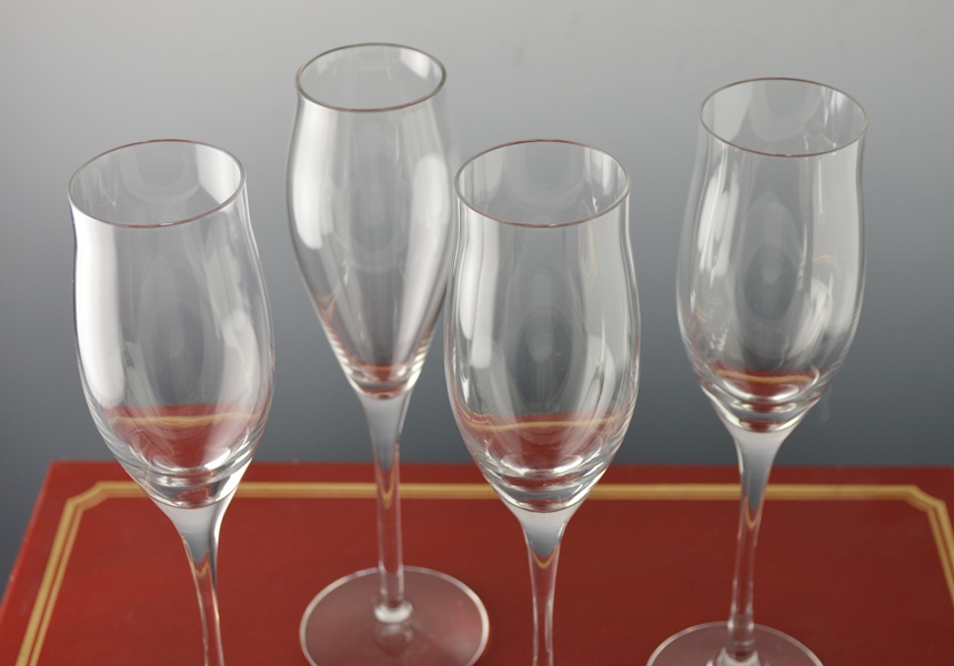 Eight Cartier Crystal Tulip-Flared Champagne Flutes