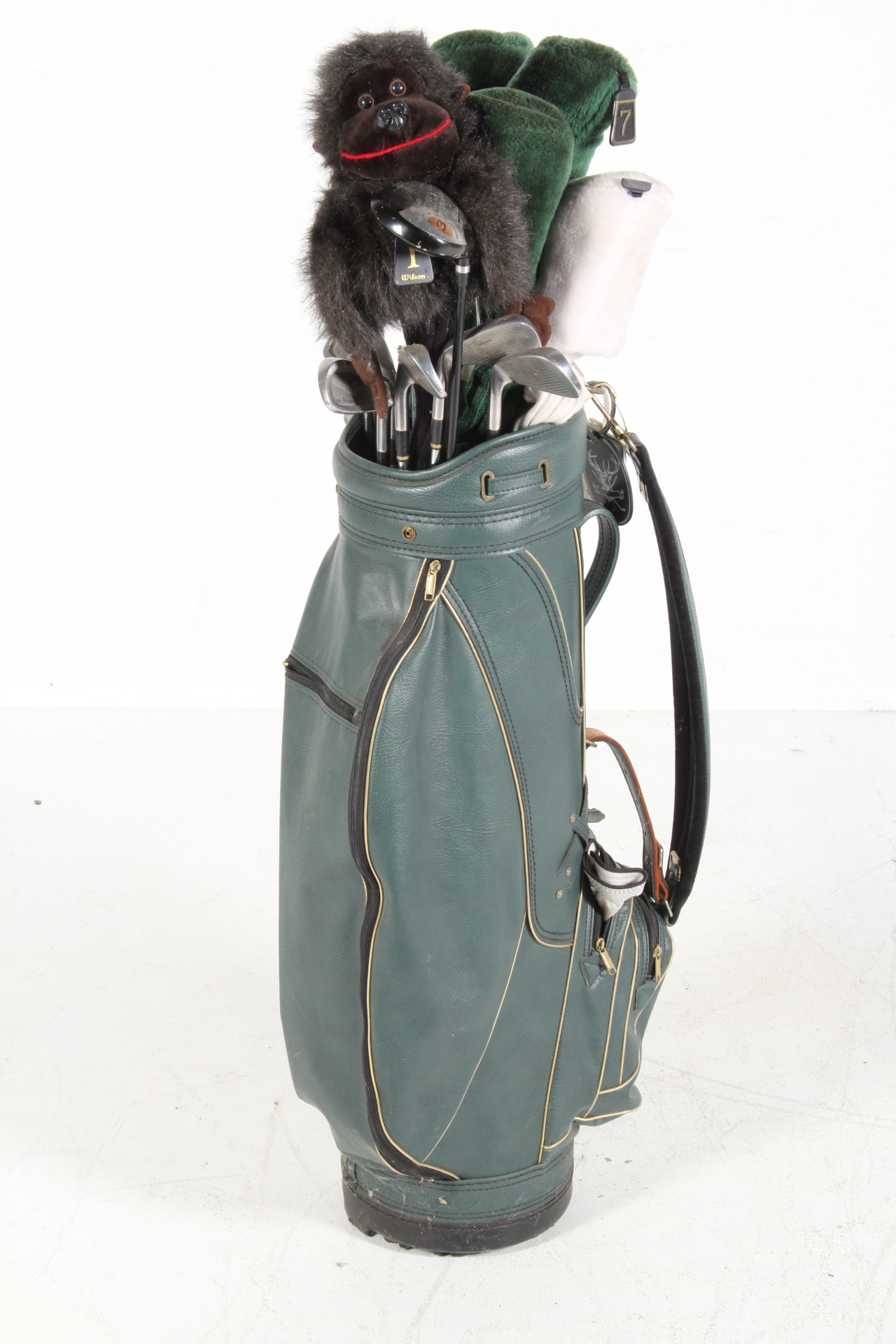Golf Clubs with Vintage Leather Burton Bag