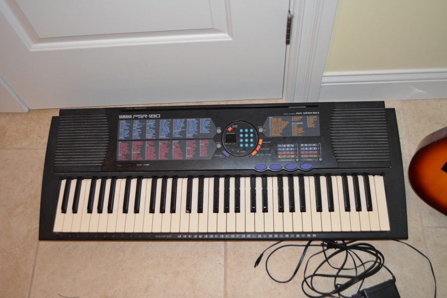 Yamaha Keyboard PSR-180 and First Act Discovery Student Guitar