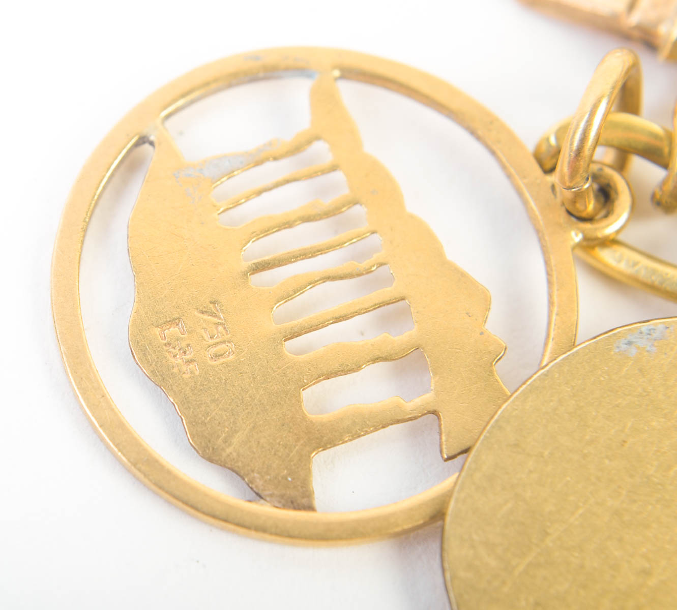 Gold Tone Charm Bracelet with 10K-18K Gold Charms