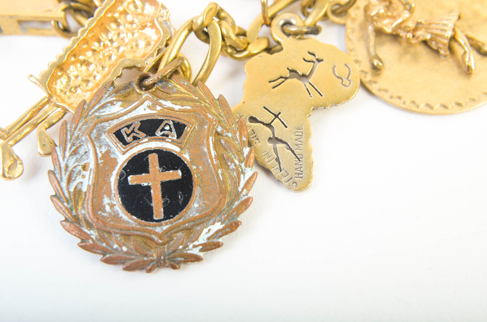 Gold Tone Charm Bracelet with 10K-18K Gold Charms