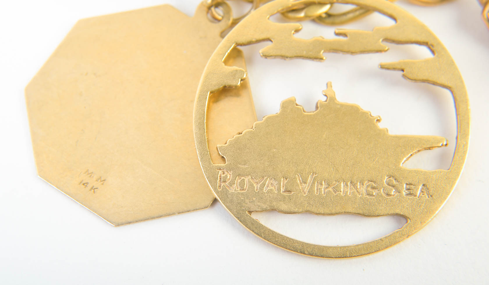 Gold Tone Charm Bracelet with 10K-18K Gold Charms