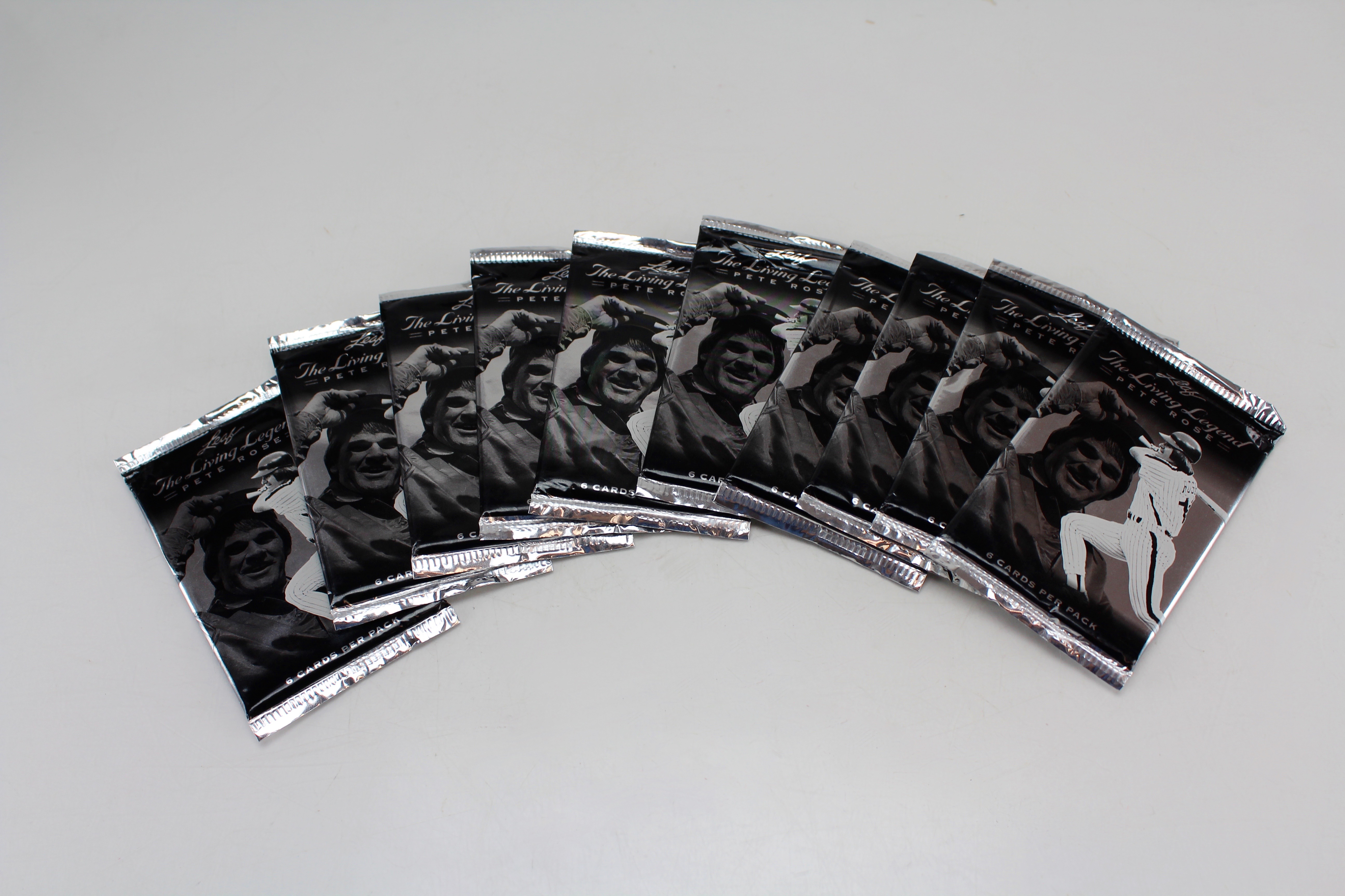 Beckett Magazine and Unopened Card Packs Featuring Pete Rose