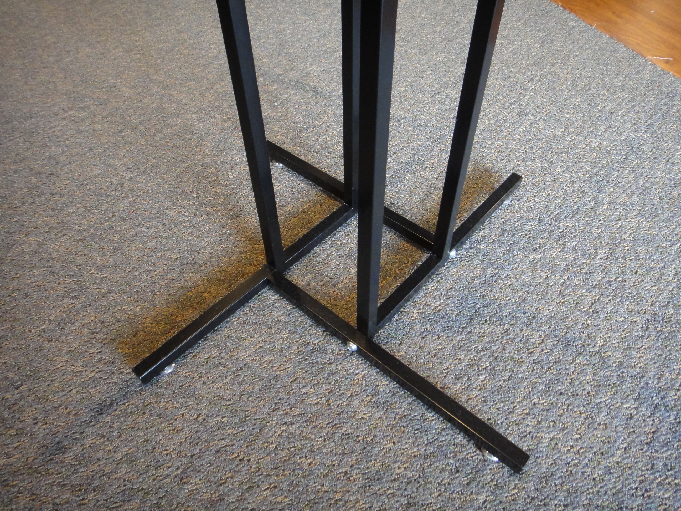 Two Commercial Grade Four Arm Metal Clothing Rack