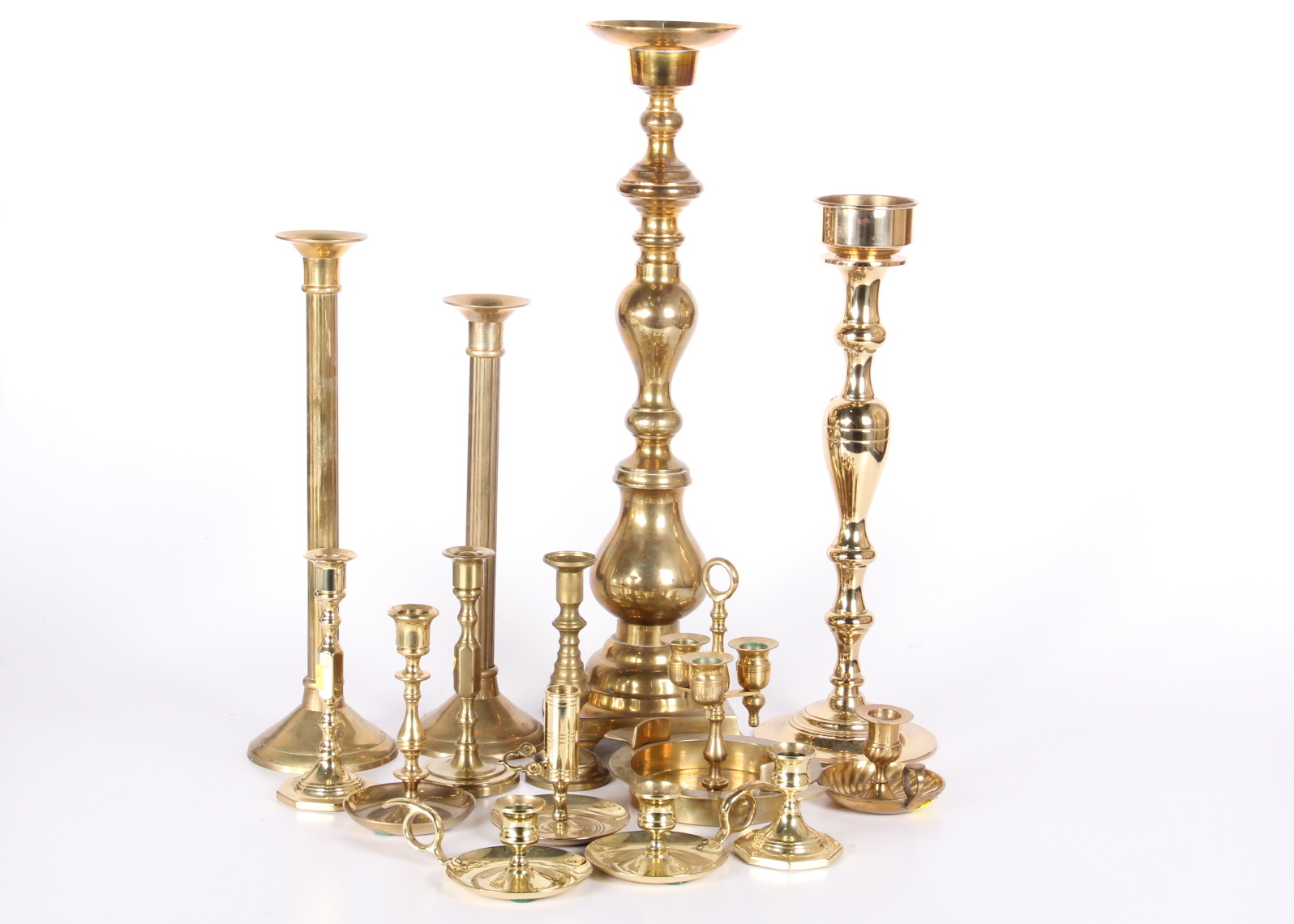 Generous Collection of Brass Candle Holders