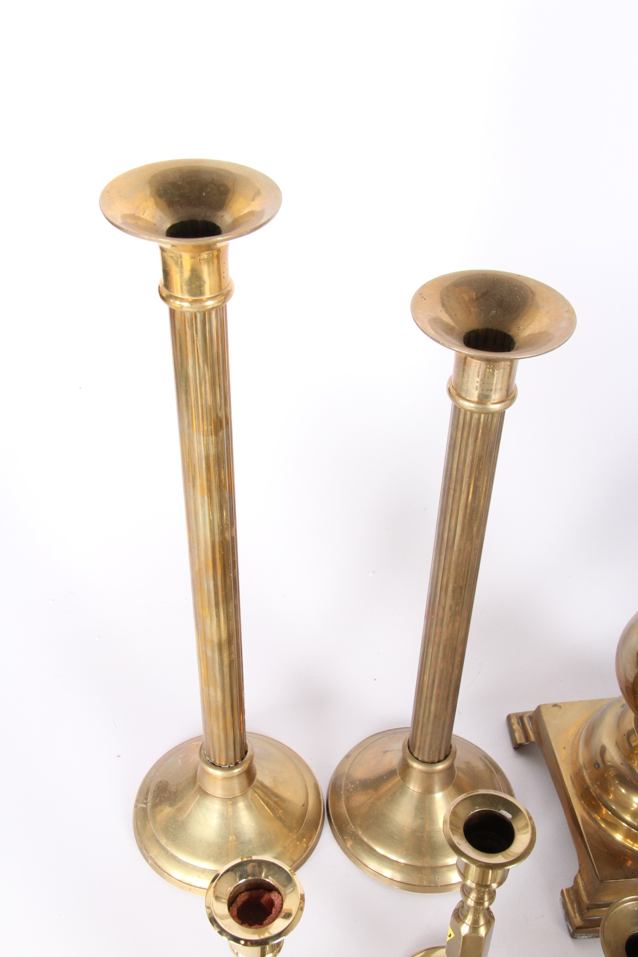 Generous Collection of Brass Candle Holders