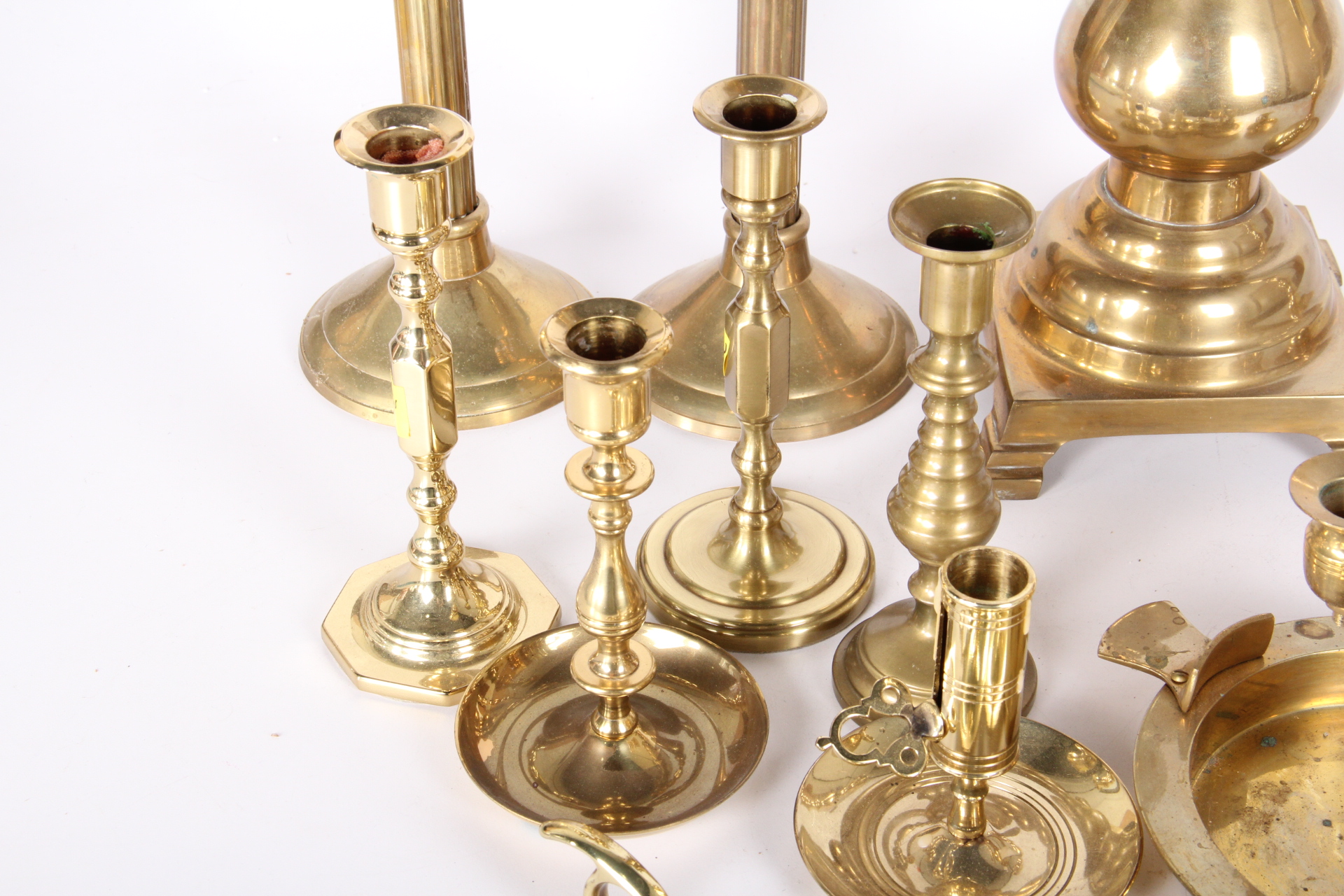 Generous Collection of Brass Candle Holders