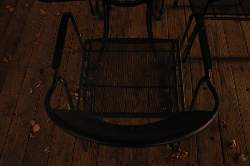 Black Metal Patio Table with Three Chairs