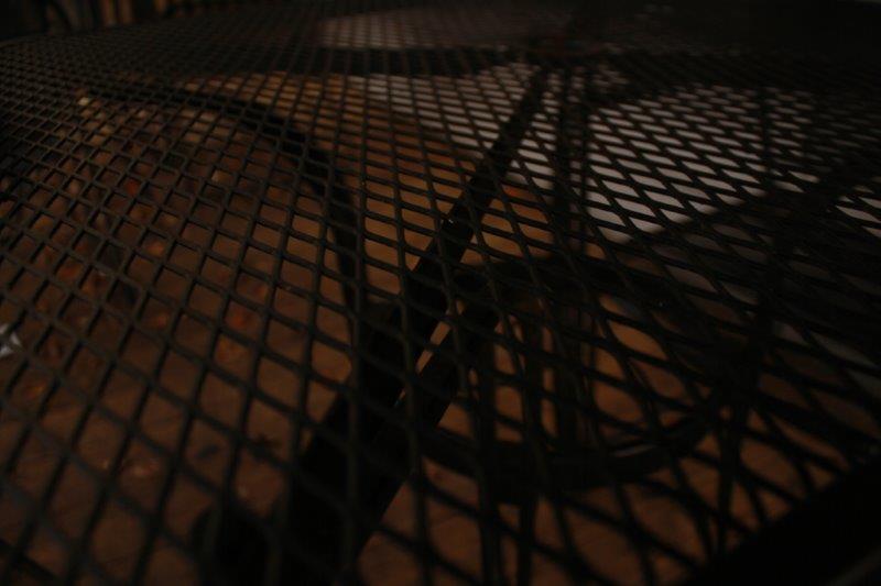 Black Metal Patio Table with Three Chairs