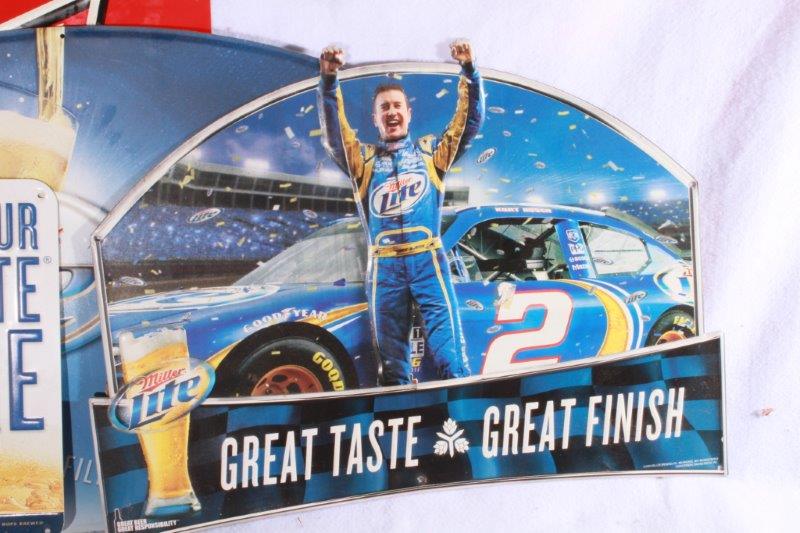 Four Beer Advertisement Signs