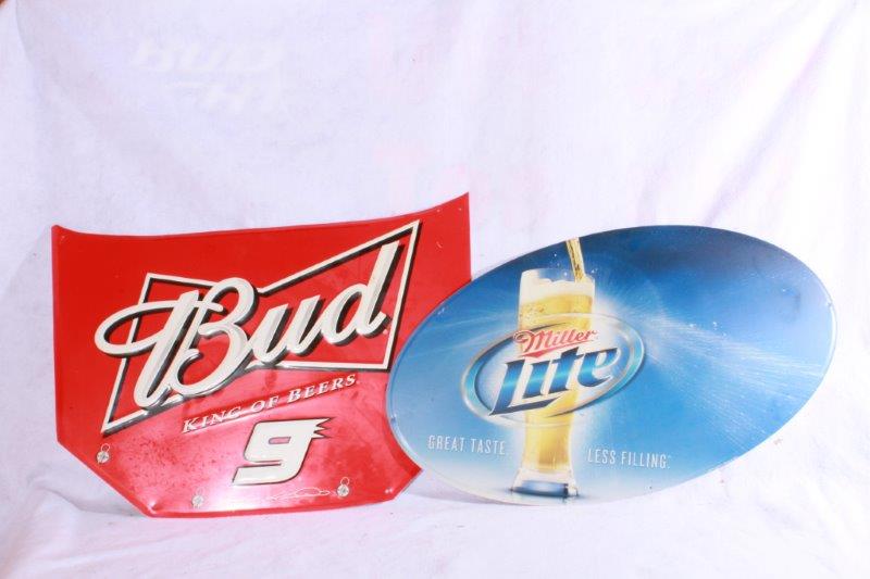 Four Beer Advertisement Signs