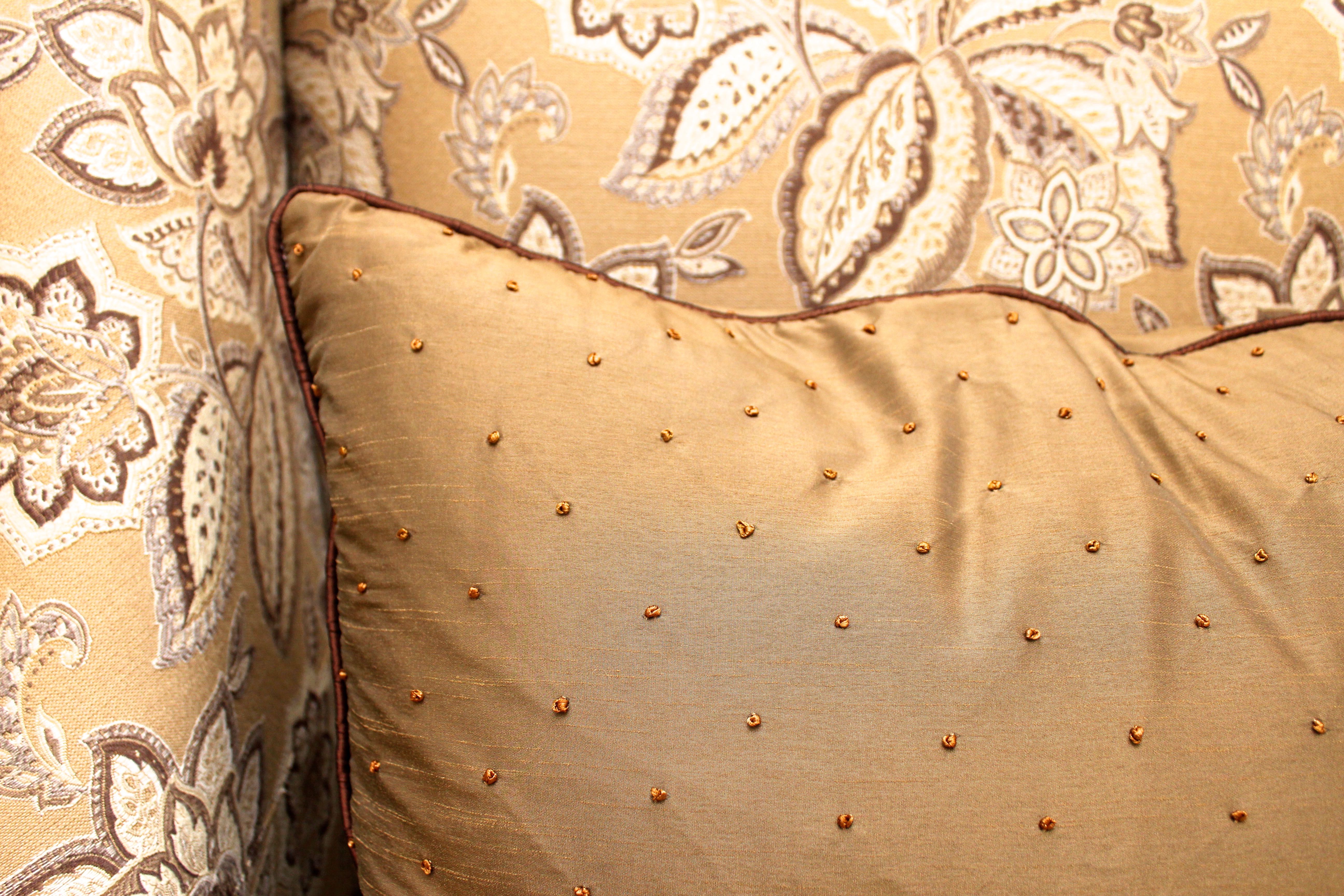 Oversized Upholstered Armchair with Turned Legs and Stetchers