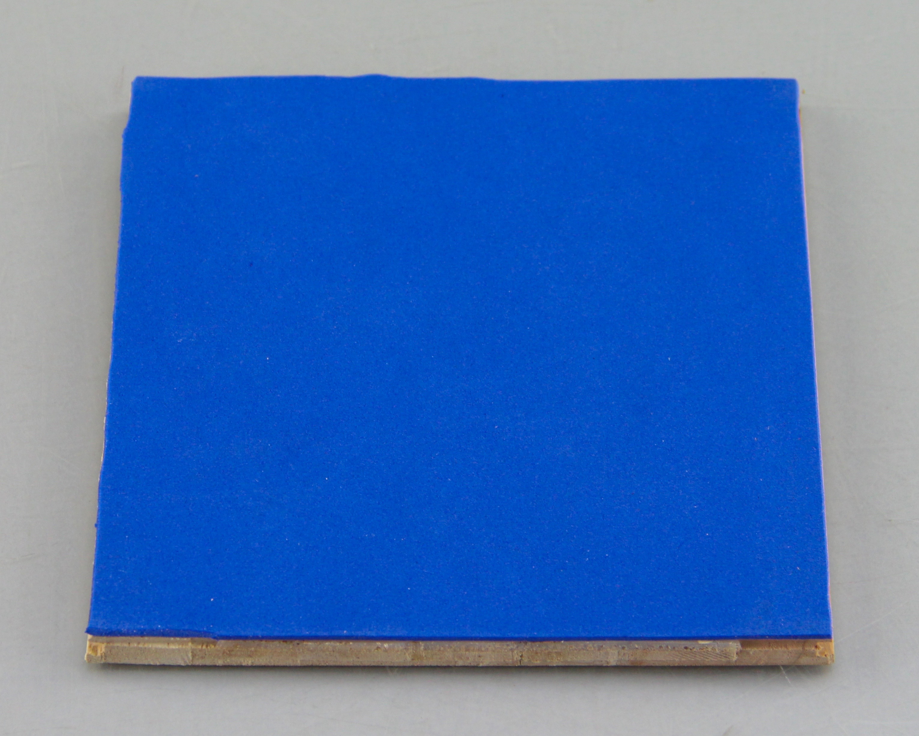 An Autographed Bill Keightley Wood Piece