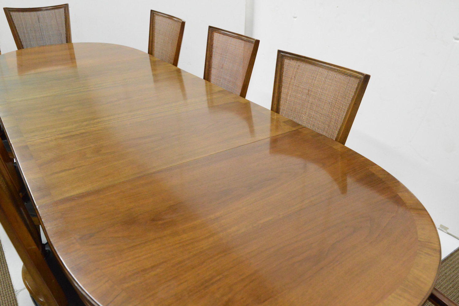 Watertown Slide Table and Eight Chairs