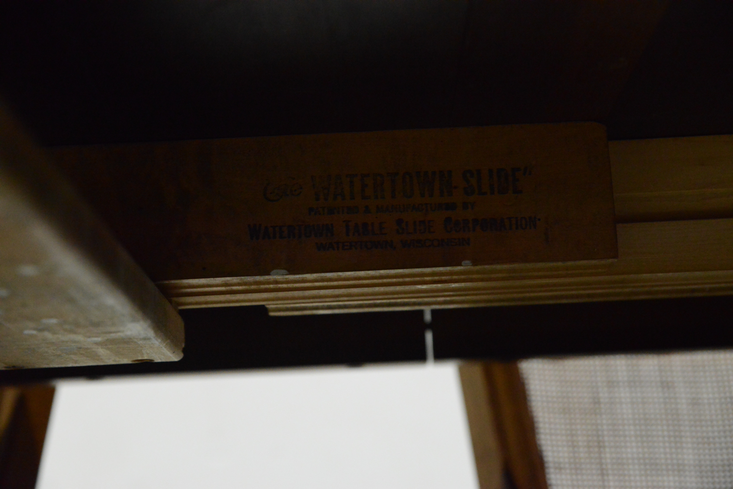 Watertown Slide Table and Eight Chairs