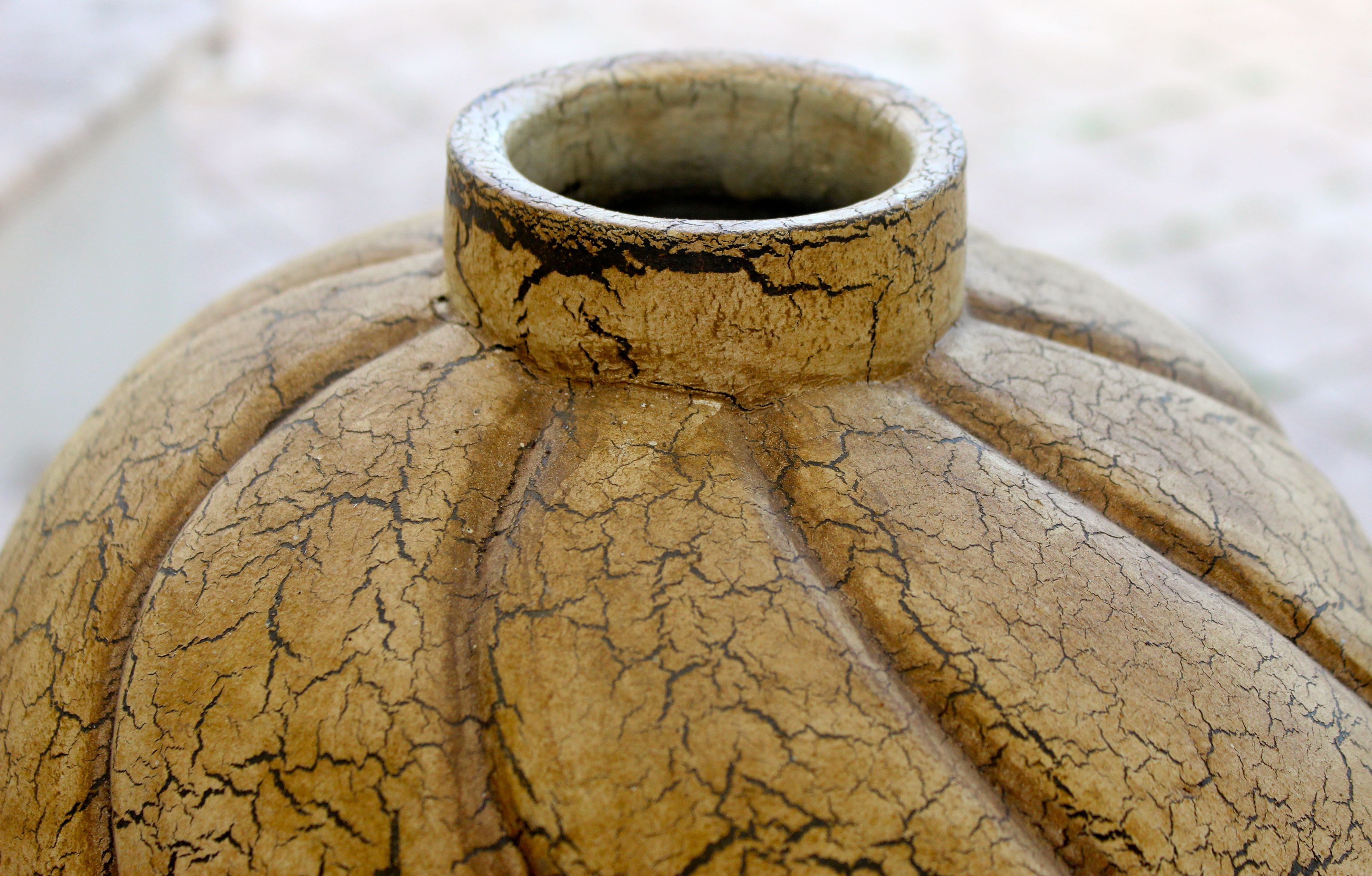 Pair of Distressed Ceramic Jars with Lids
