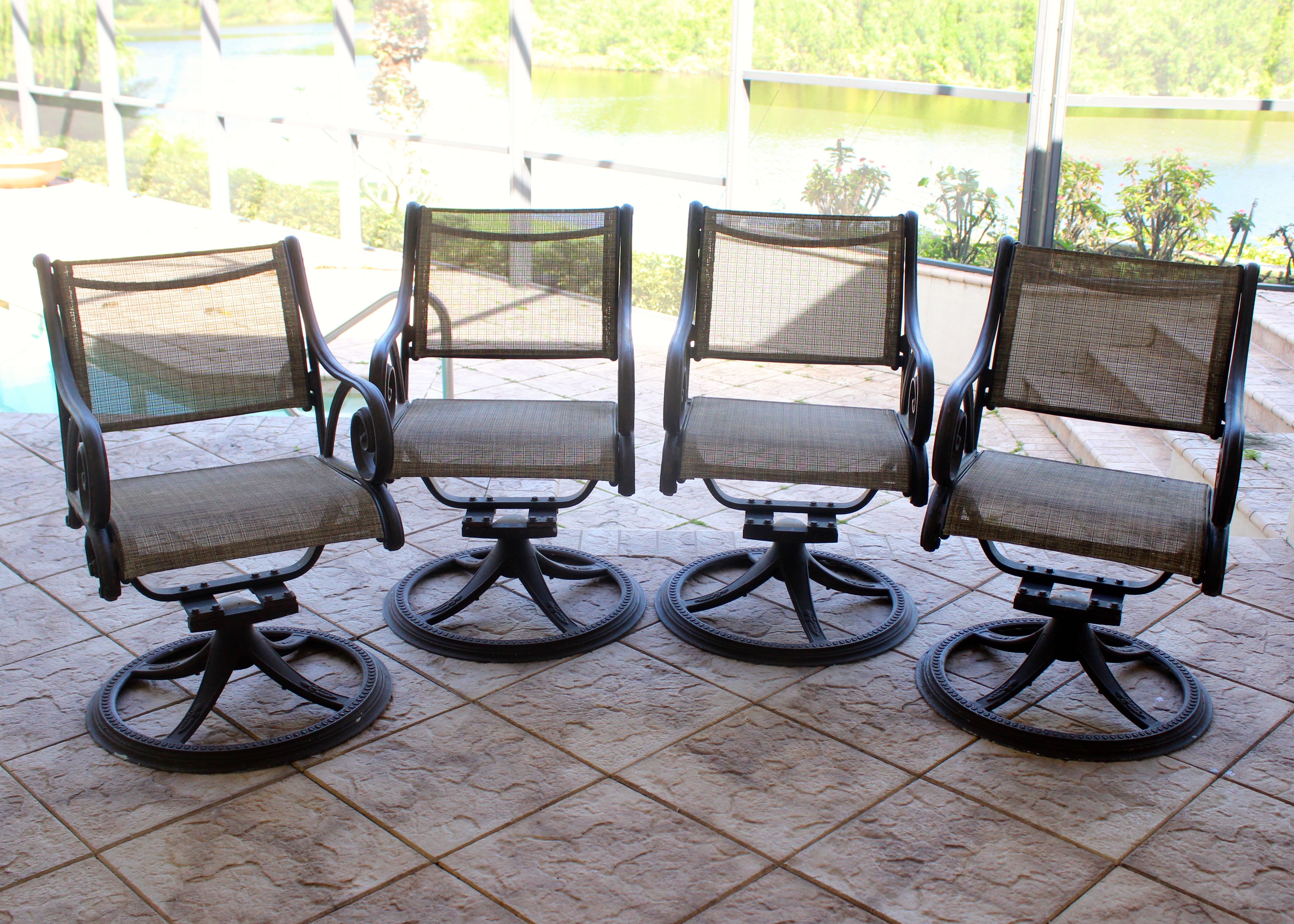 Set of Four Swivel Armchairs by Woodard Landgrave