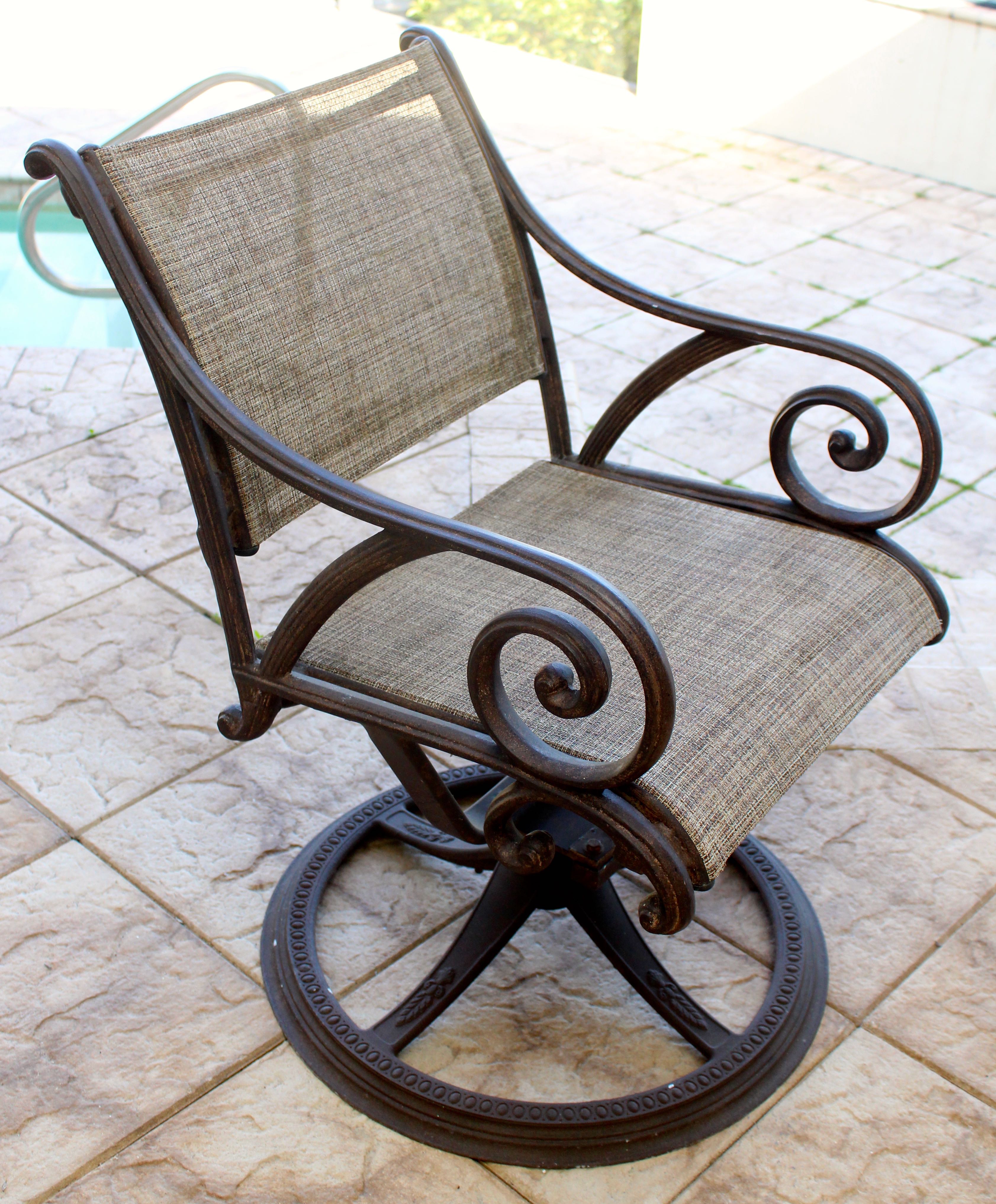 Set of Four Swivel Armchairs by Woodard Landgrave