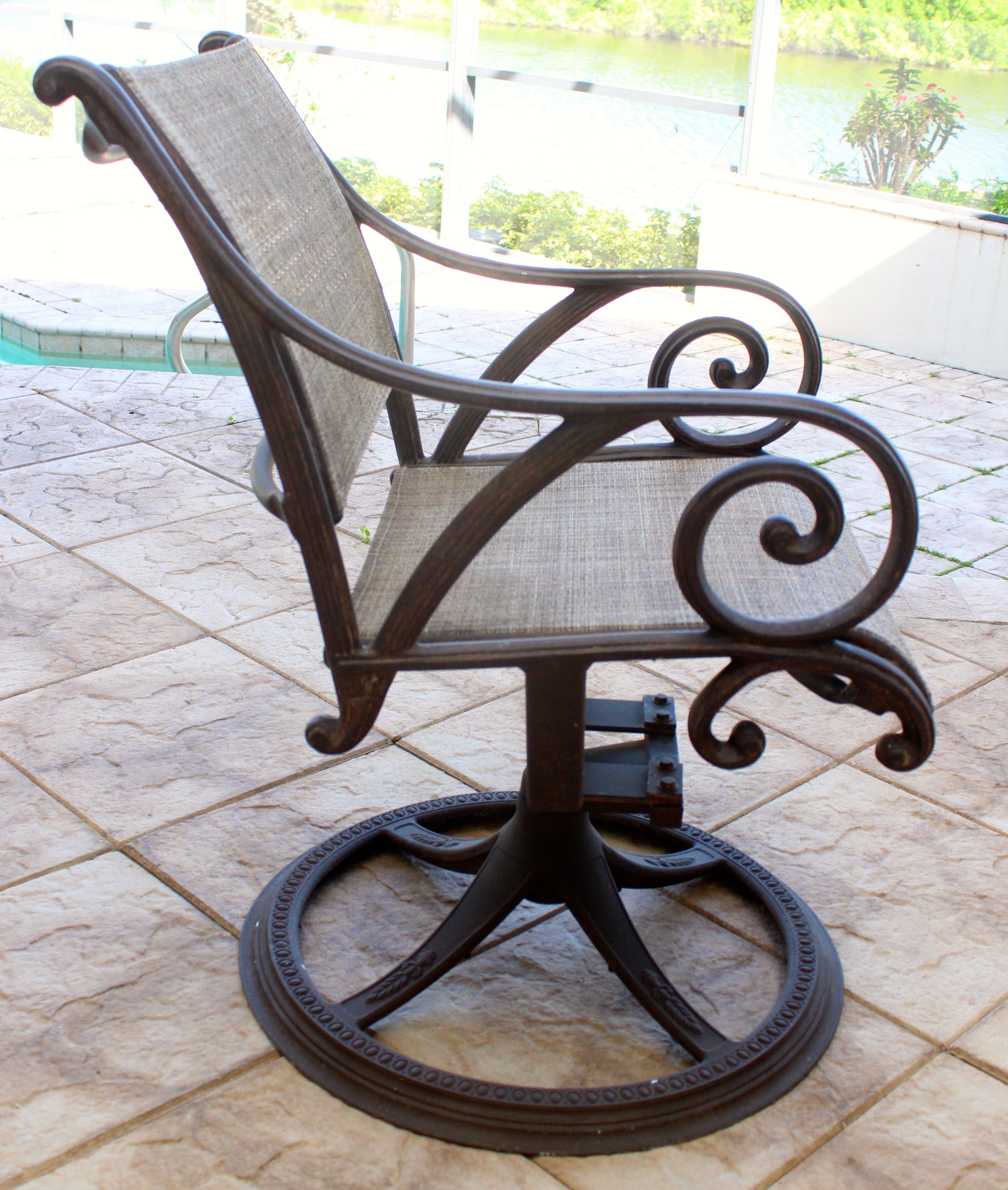 Set of Four Swivel Armchairs by Woodard Landgrave