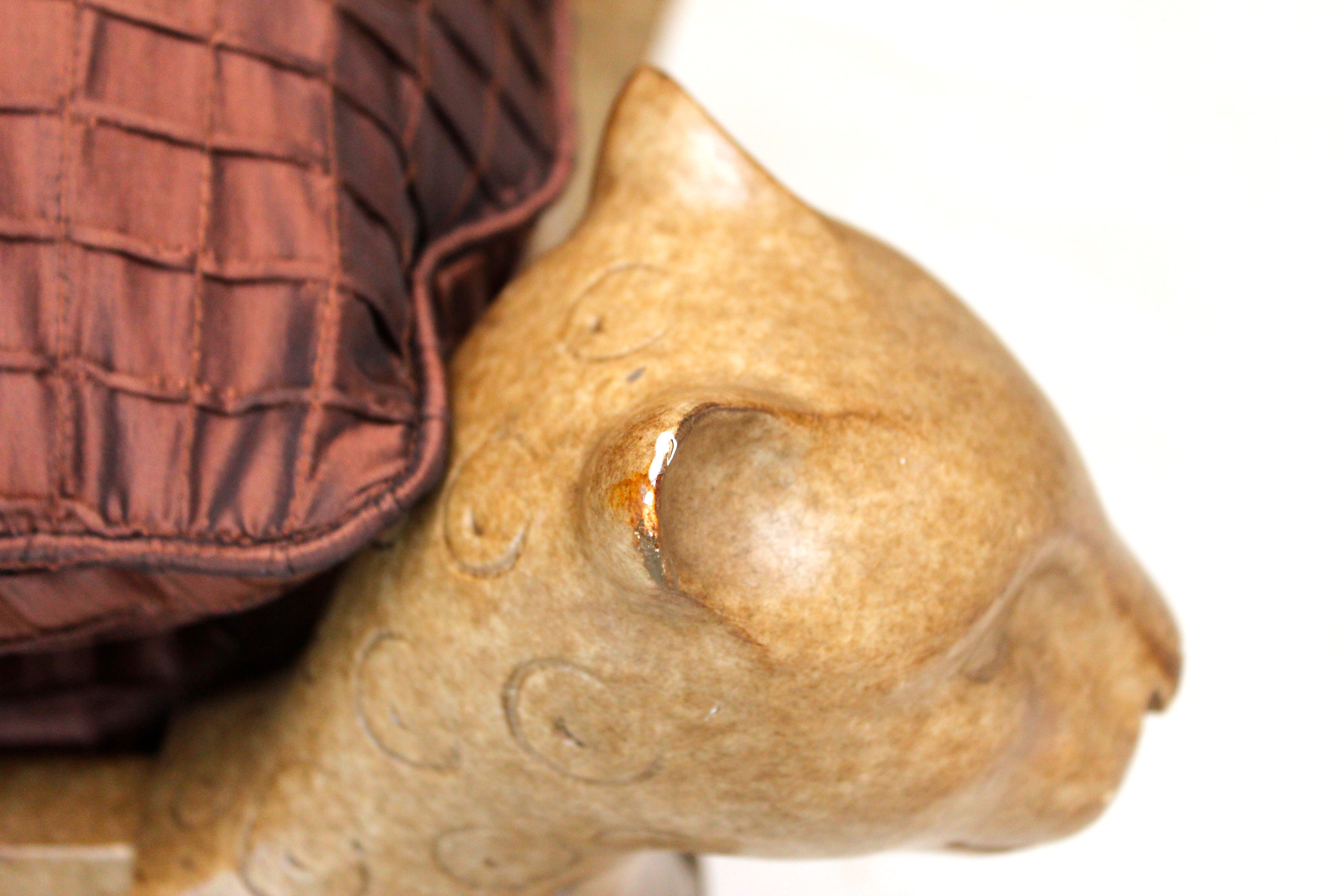 Maroon Cushioned Ottoman With Cat Head Accents