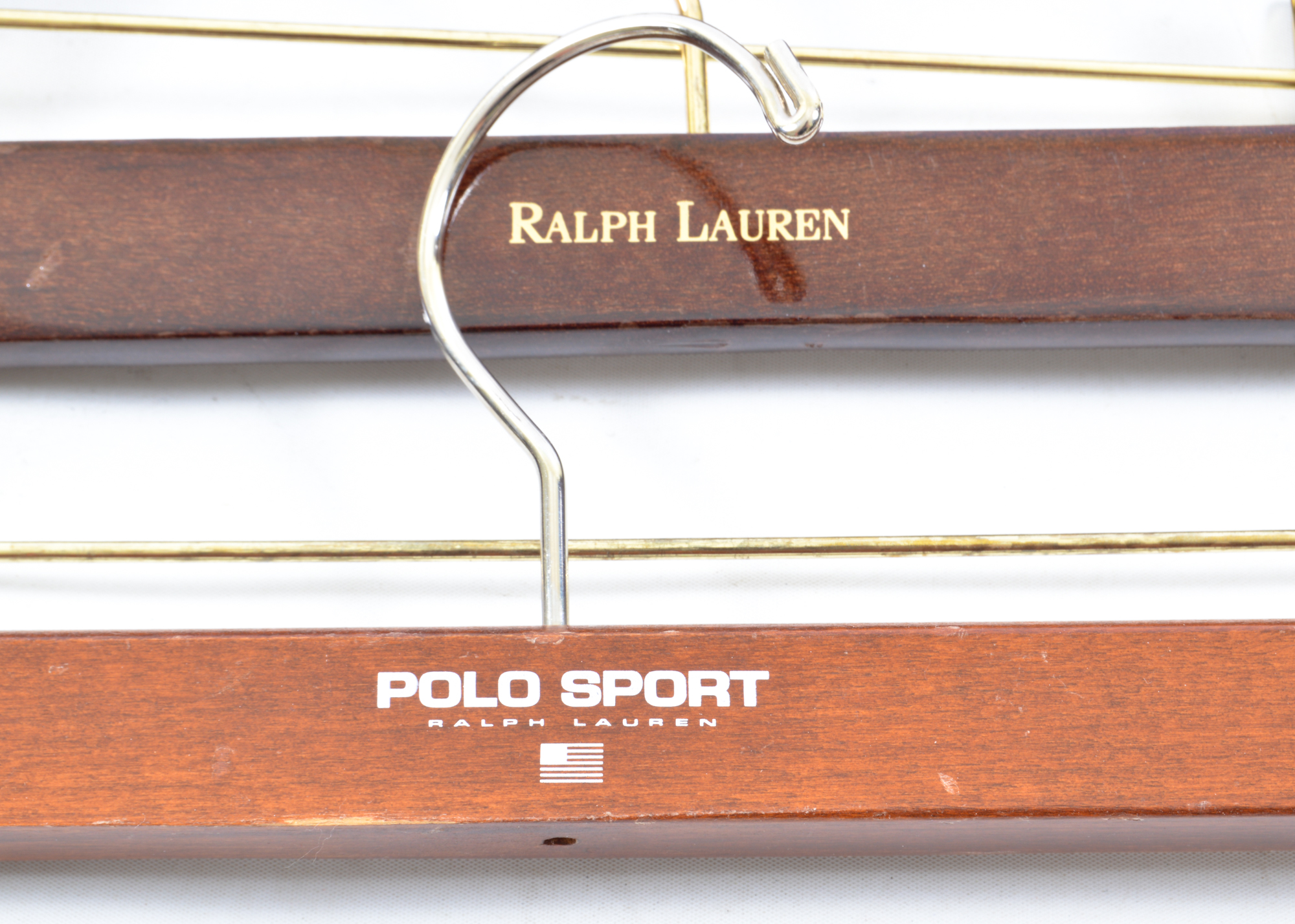 Assortment of Hangers Featuring Chanel and Ralph Lauren